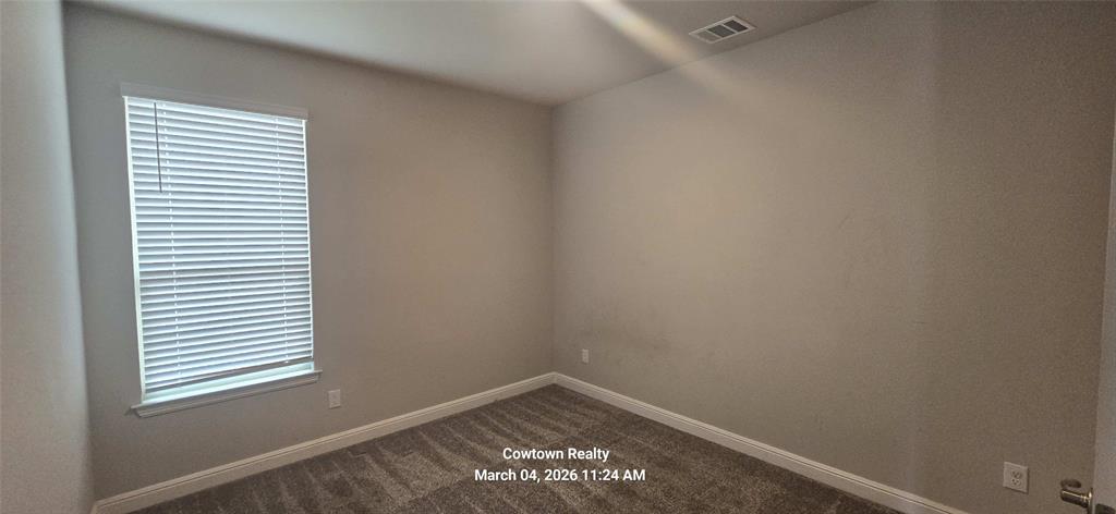 2340 Goodnight Ranch Drive Weatherford, TX 76087 - Photo 7 of 19 an empty room with a window