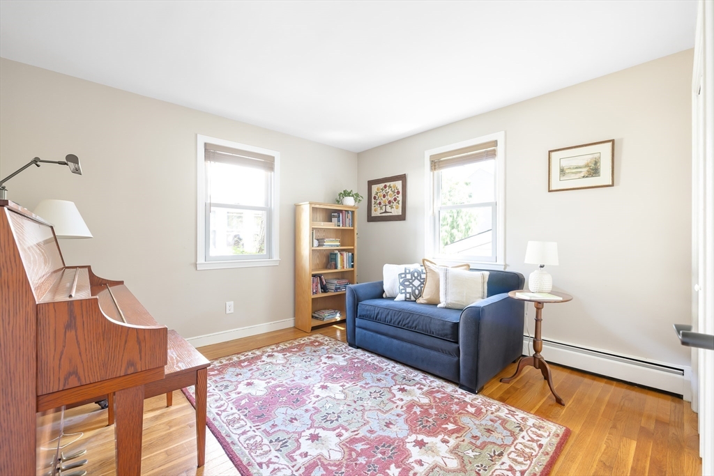28 Cottage Street Natick, MA 01760 - Photo 20 of 32 a living room with furniture and a window