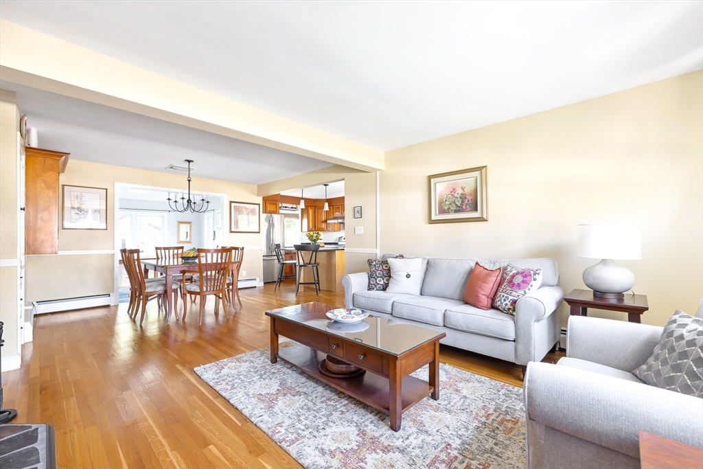 28 Cottage Street Natick, MA 01760 - Photo 4 of 32 a living room with furniture and wooden floor