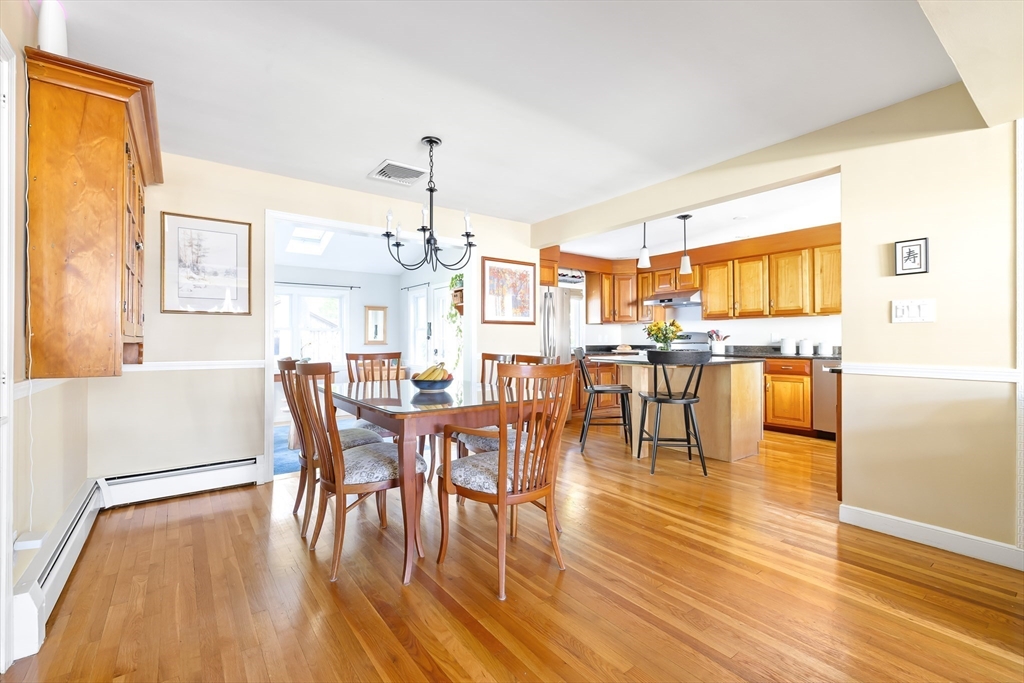 28 Cottage Street Natick, MA 01760 - Photo 8 of 32 a view of a dining room with furniture and wooden floor