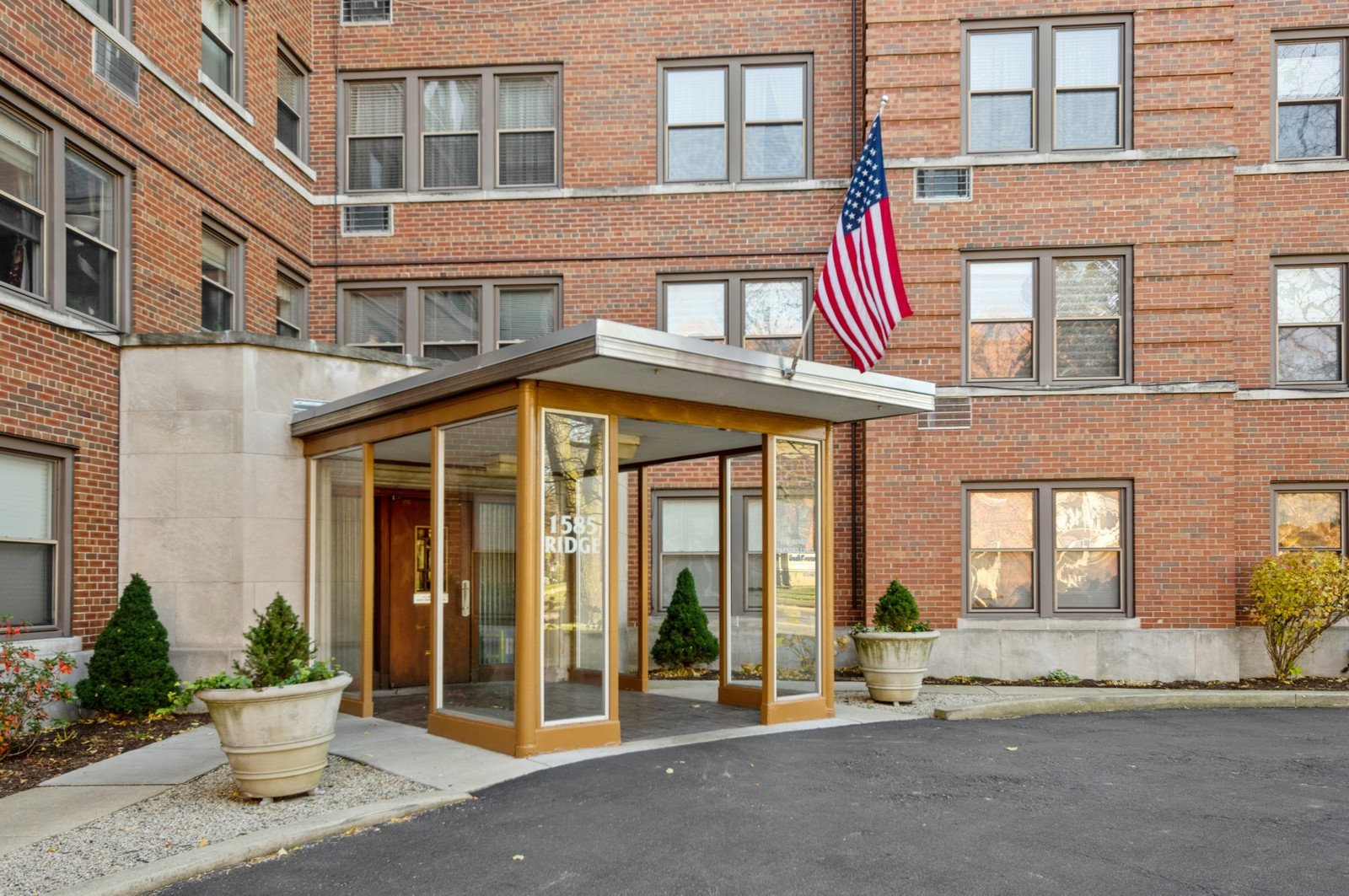 a view of a building with a porch