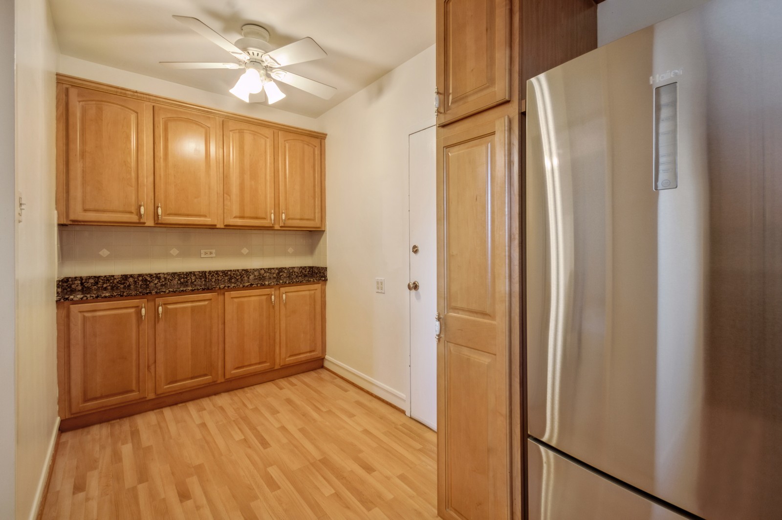 1585 Ridge Avenue, Unit 302 Evanston, IL 60201 - Photo 6 of 21 a view of a kitchen with electric appliances