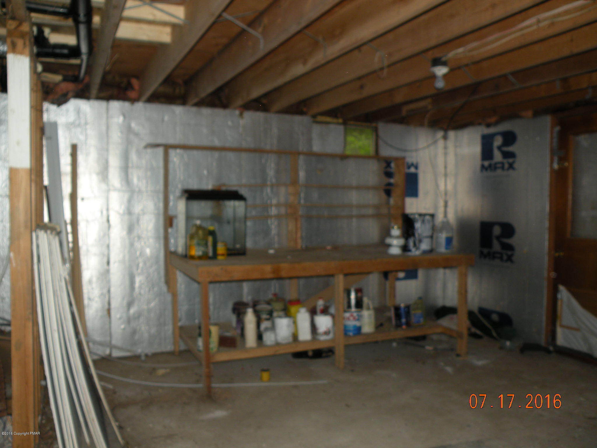 1096 Clover Road South Long Pond, PA 18334 - Photo 15 of 15 a room with wooden furniture and a window