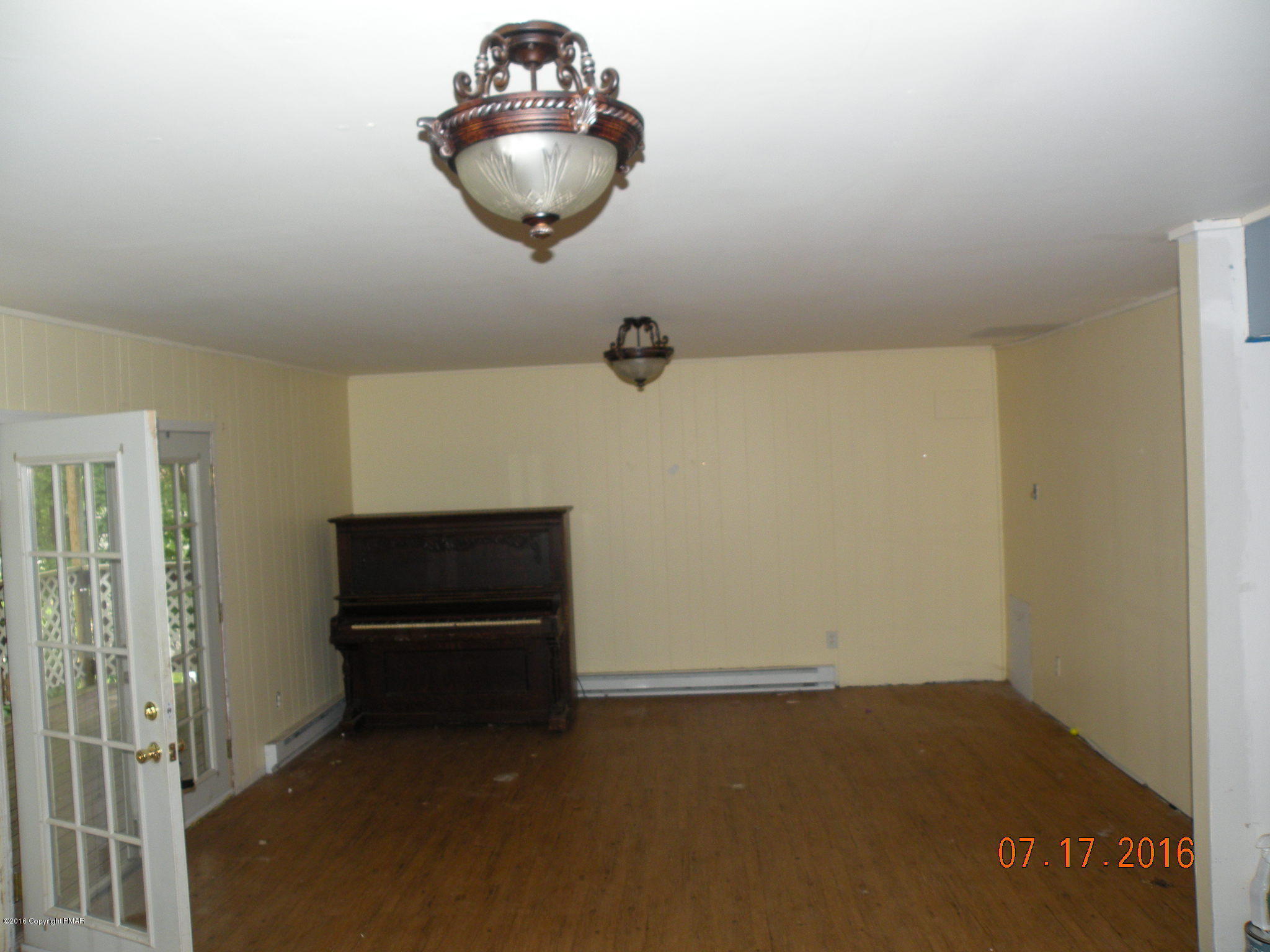 1096 Clover Road South Long Pond, PA 18334 - Photo 3 of 15 a view of a livingroom with a sink