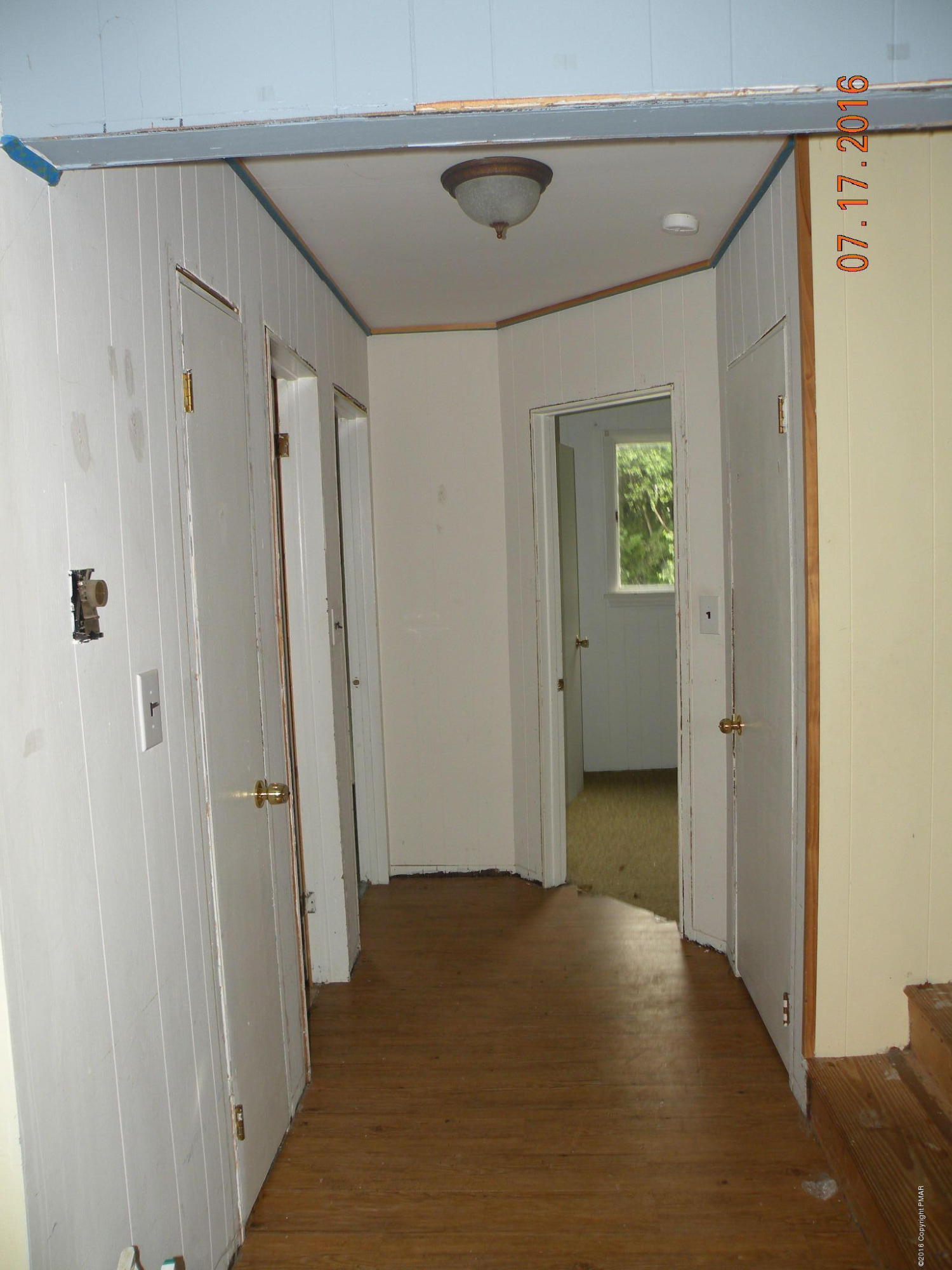 1096 Clover Road South Long Pond, PA 18334 - Photo 4 of 15 a view of hallway with wooden floor