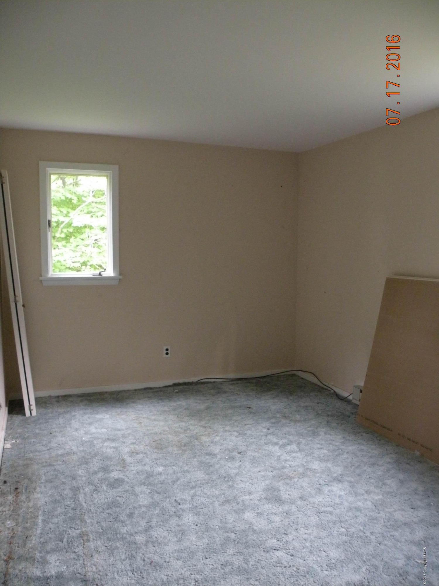 1096 Clover Road South Long Pond, PA 18334 - Photo 5 of 15 an empty room with a window