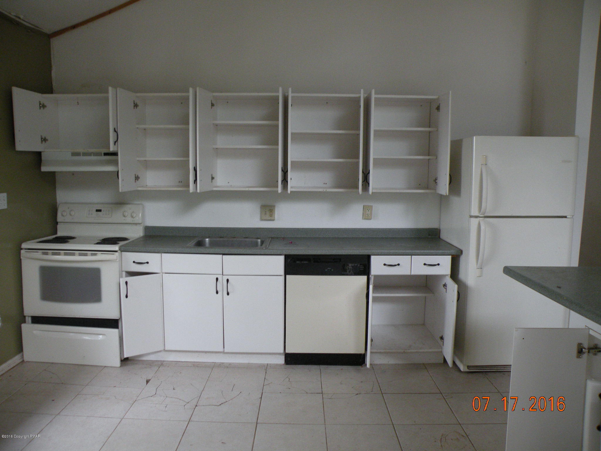 1096 Clover Road South Long Pond, PA 18334 - Photo 10 of 15 a kitchen with cabinets and appliances