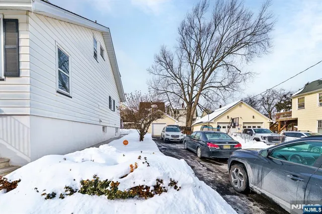 a view of a cars in front of house