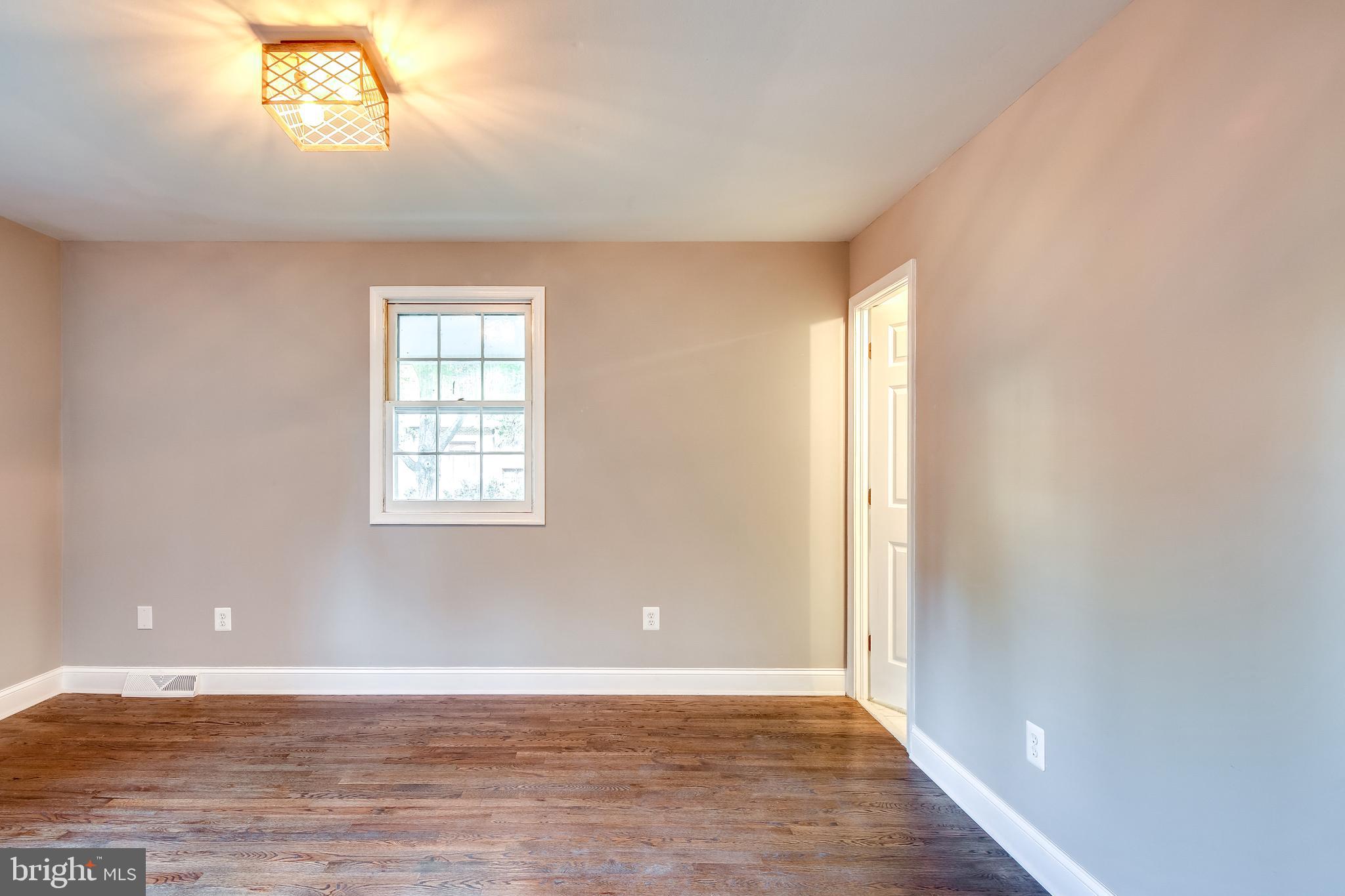 7109 Redmiles Road Laurel, MD 20707 - Photo 11 of 35 Owner's Bedroom with Attached Bath