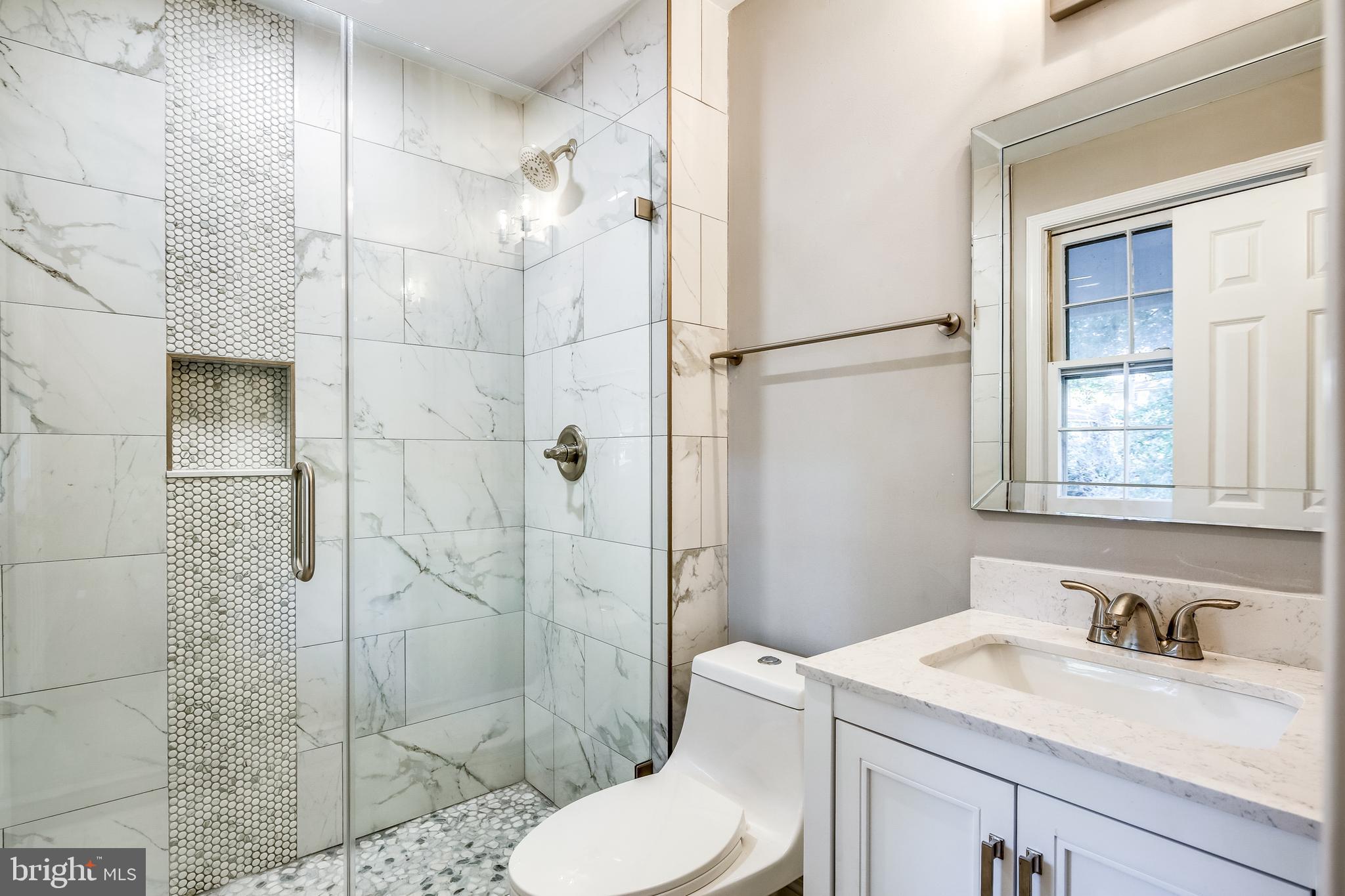 7109 Redmiles Road Laurel, MD 20707 - Photo 13 of 35 Updated Owner's Bathroom