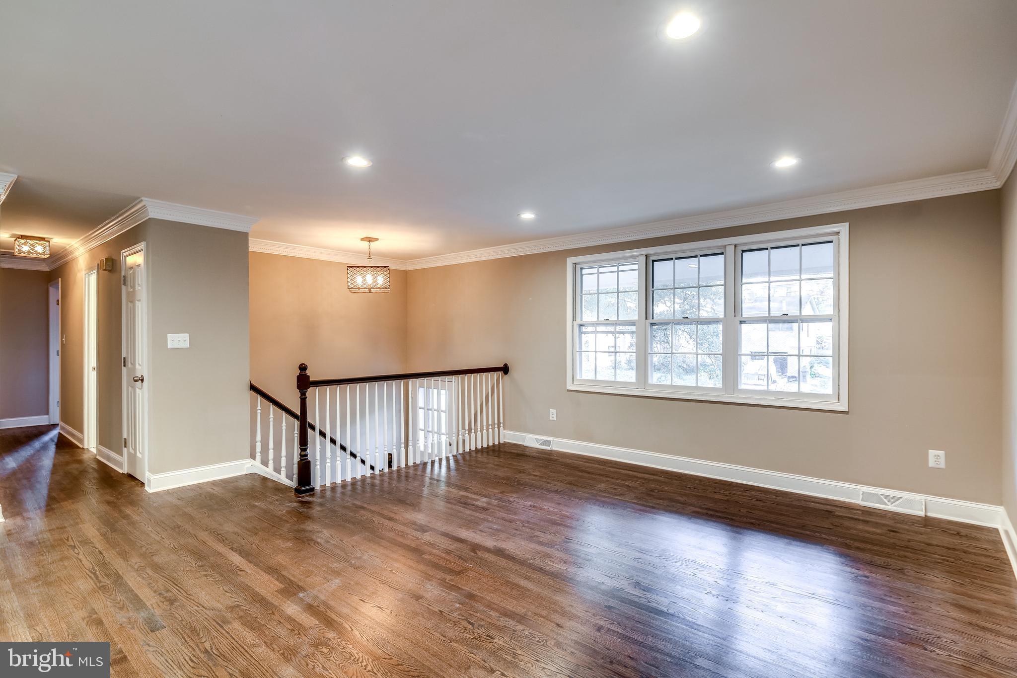 7109 Redmiles Road Laurel, MD 20707 - Photo 19 of 35 Refinished hardwood floors throughout main level
