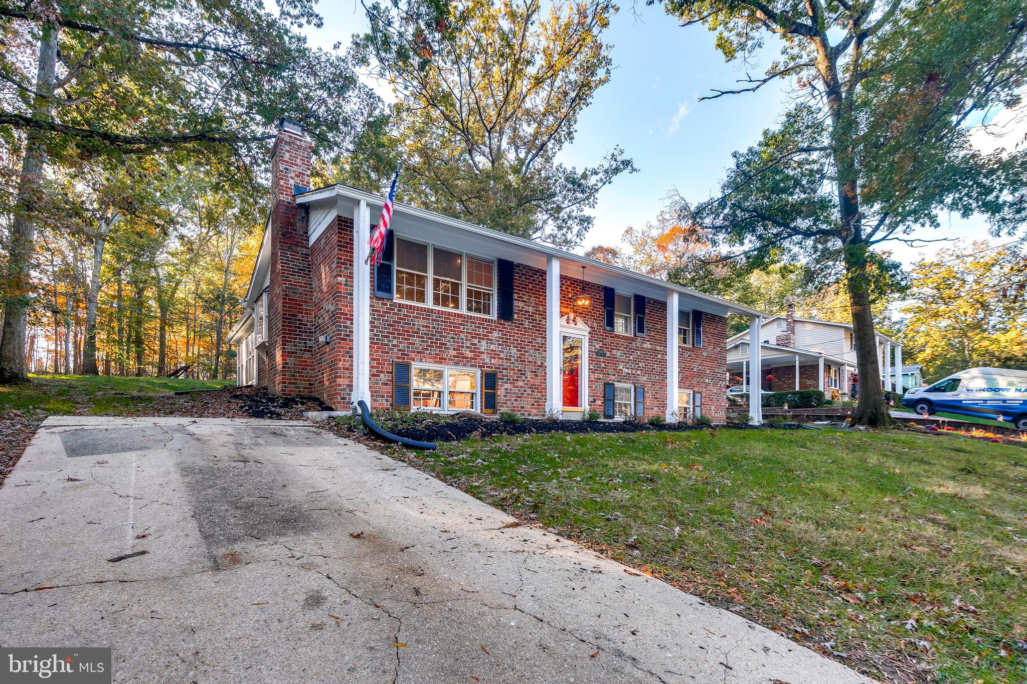 7109 Redmiles Road Laurel, MD 20707 - Photo 3 of 35 Located on a double lot lined with trees