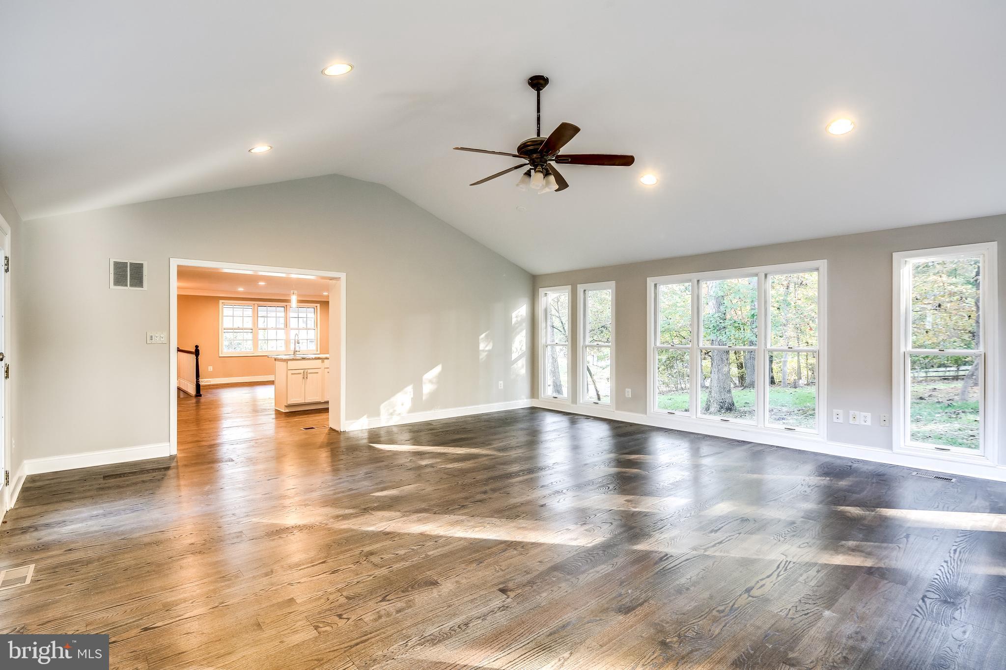 7109 Redmiles Road Laurel, MD 20707 - Photo 6 of 35 Family Room with stunning backyard views!