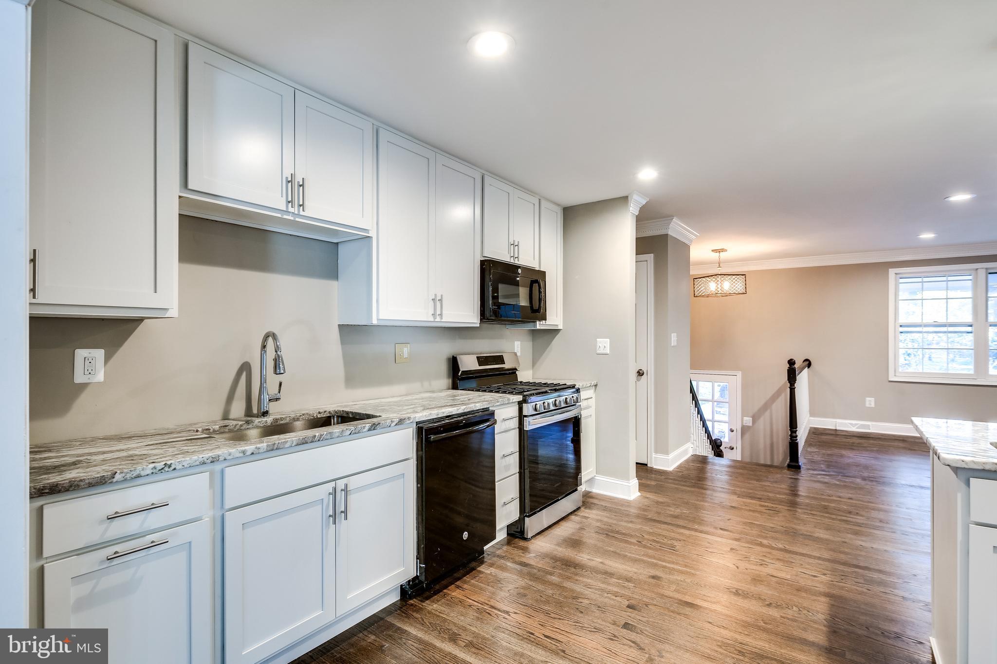 7109 Redmiles Road Laurel, MD 20707 - Photo 7 of 35 Updated kitchen with granite counters