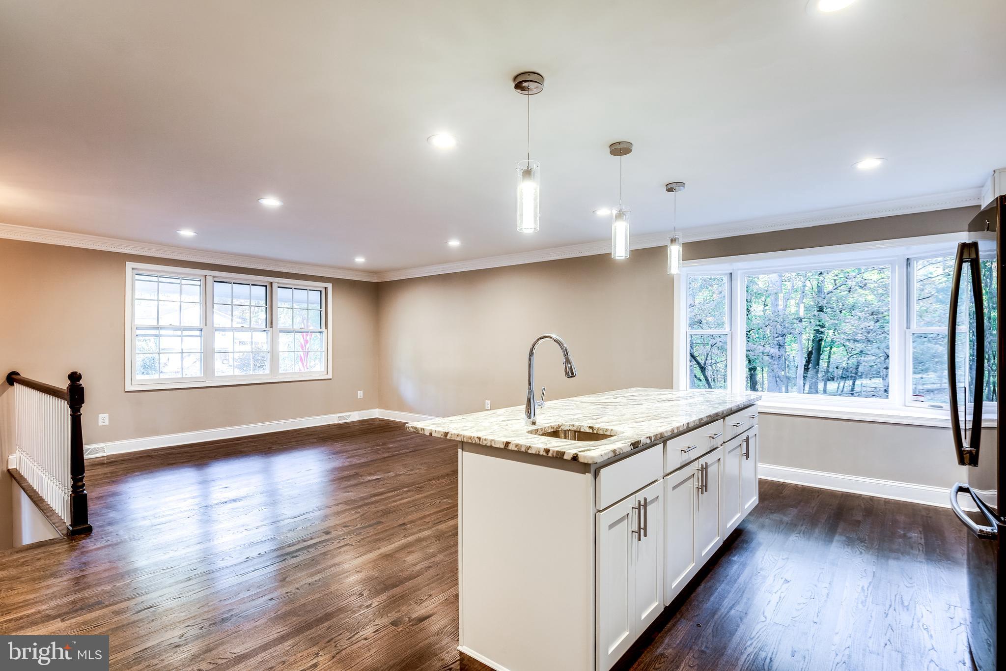7109 Redmiles Road Laurel, MD 20707 - Photo 8 of 35 Pendant lighting above the center island