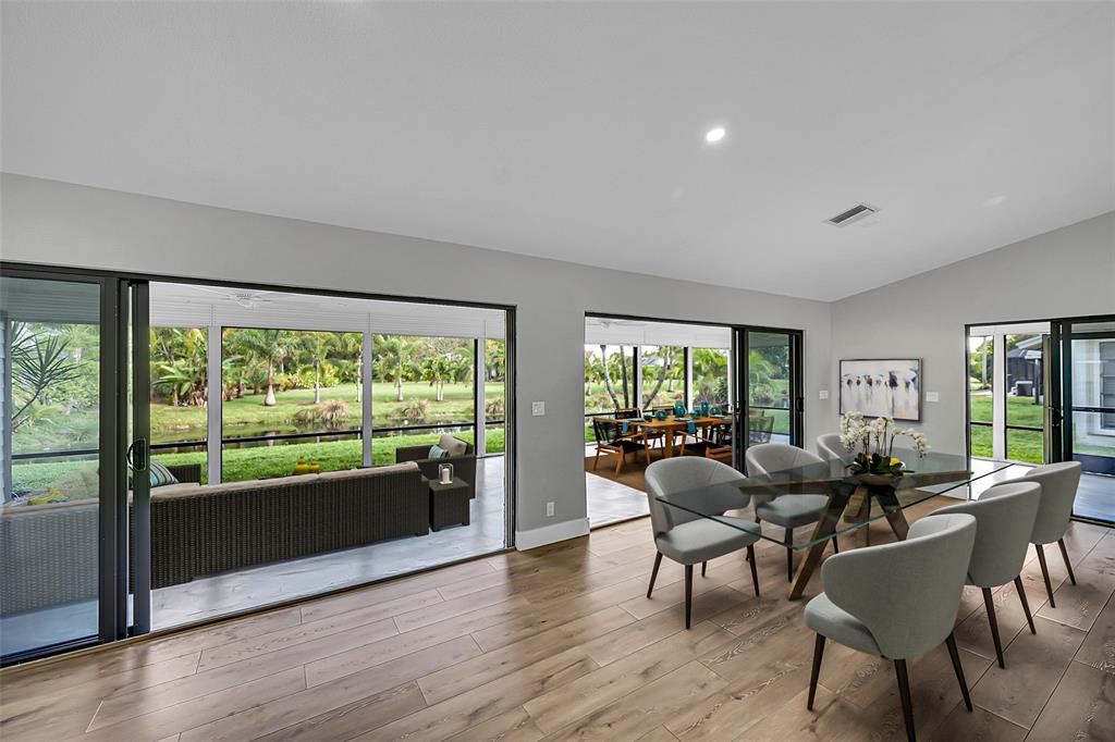 6195 Winding Brook Way Delray Beach, FL 33484 - Photo 11 of 68 a living room with furniture and a large window