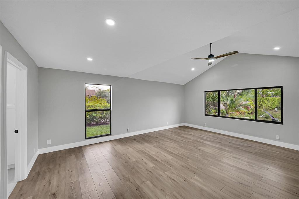 6195 Winding Brook Way Delray Beach, FL 33484 - Photo 21 of 68 an empty room with windows and entrance