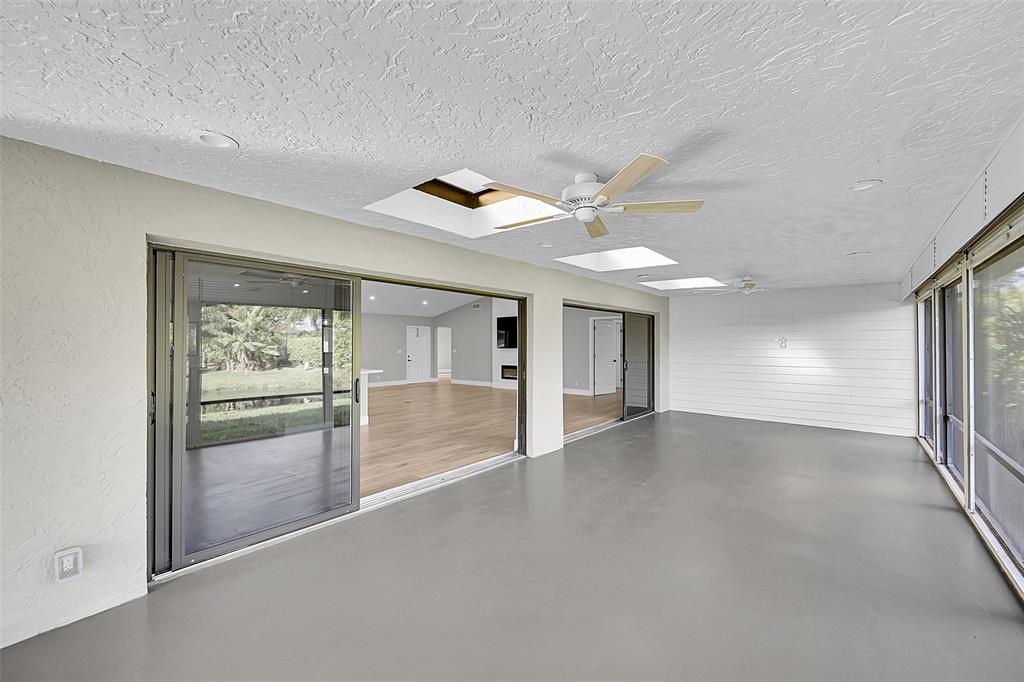 6195 Winding Brook Way Delray Beach, FL 33484 - Photo 44 of 68 a view of an empty room with a window