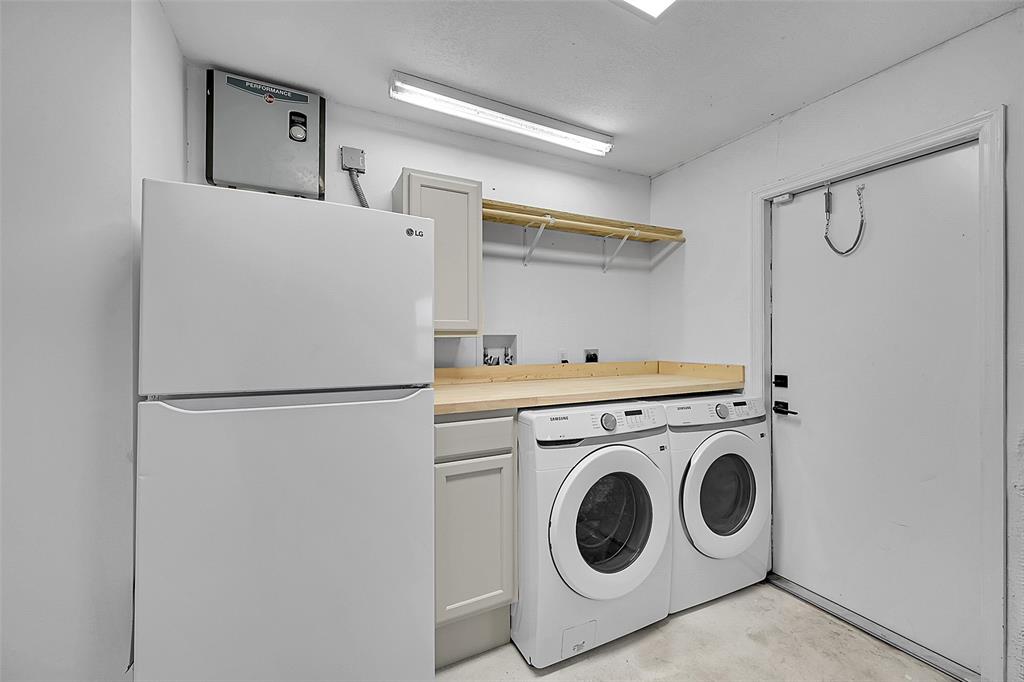 6195 Winding Brook Way Delray Beach, FL 33484 - Photo 45 of 68 a utility room with dryer and washer