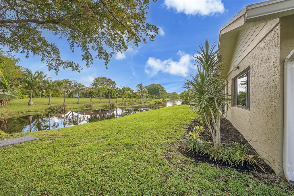 6195 Winding Brook Way Delray Beach, FL 33484 - Photo 50 of 68 Backyard Water View