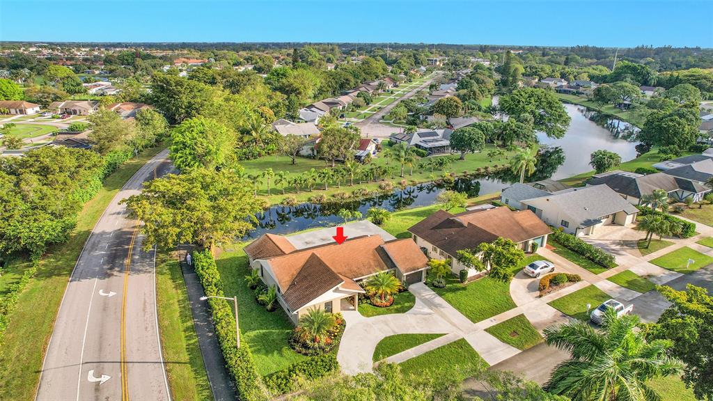 6195 Winding Brook Way Delray Beach, FL 33484 - Photo 58 of 68 an aerial view of residential houses with outdoor space and street view