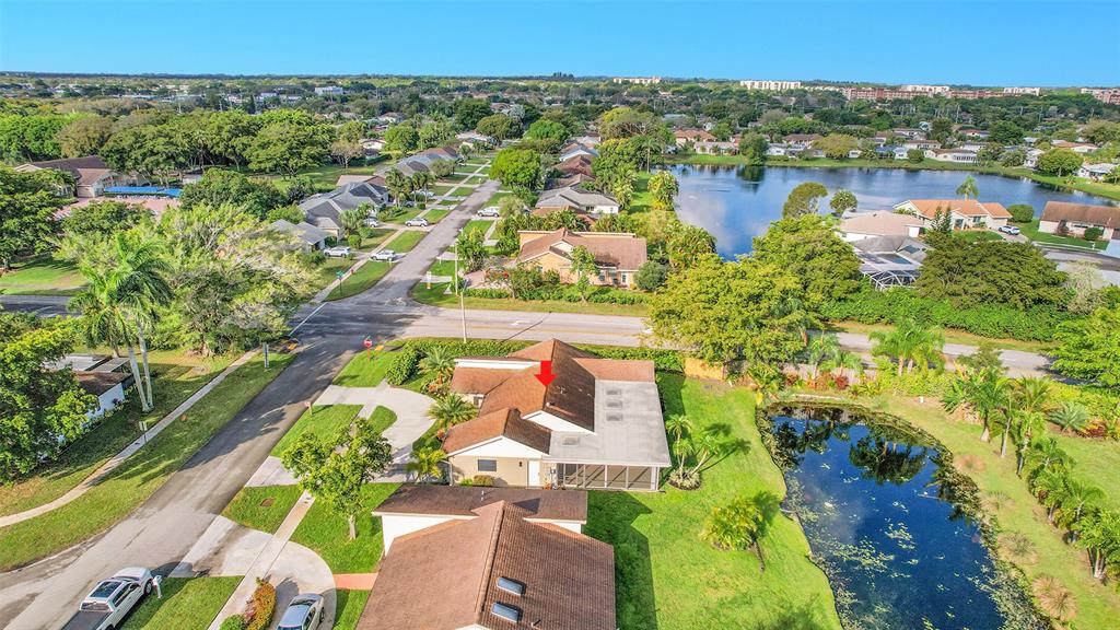6195 Winding Brook Way Delray Beach, FL 33484 - Photo 59 of 68 an aerial view of residential houses with outdoor space and lake view