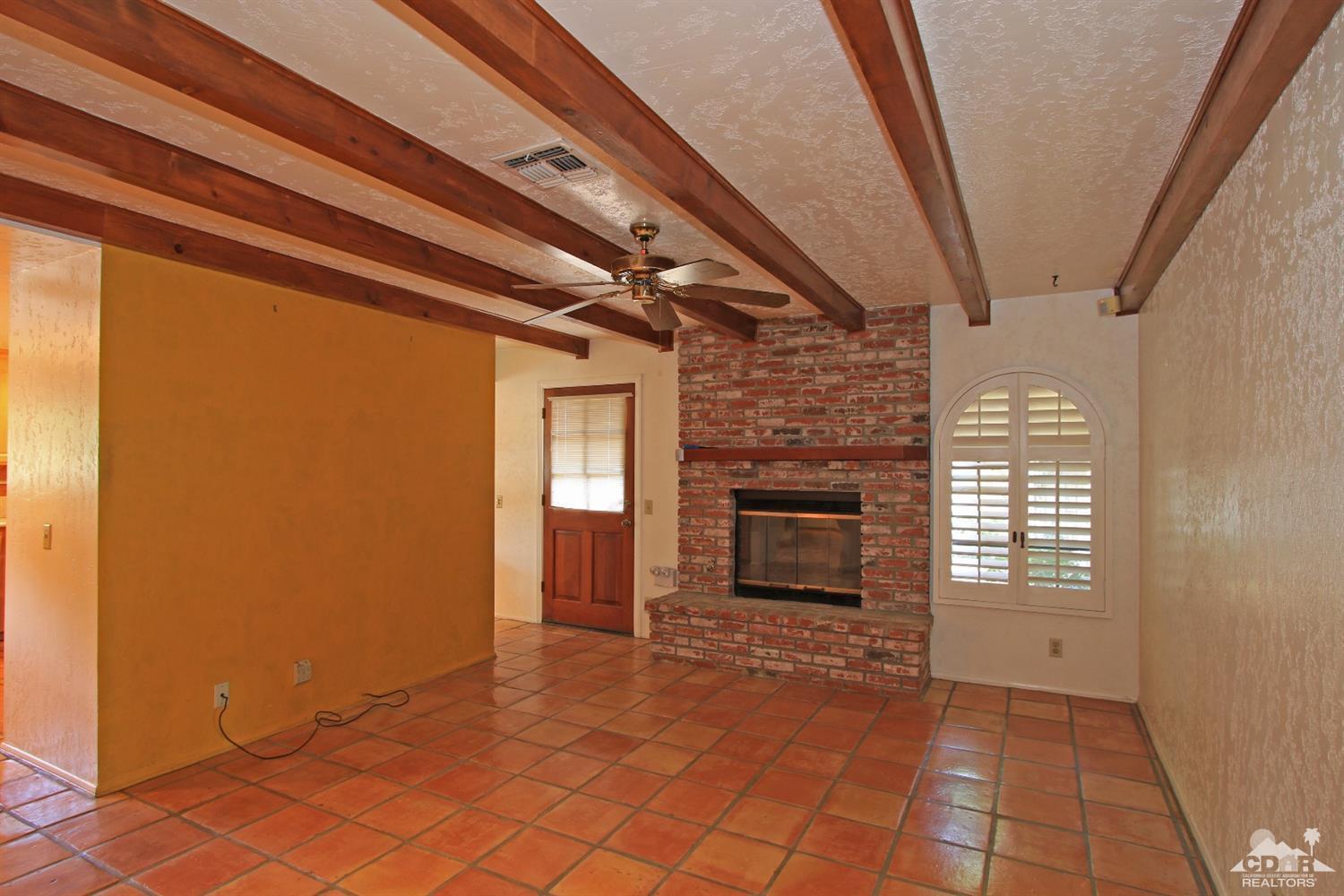 70400 Chappel Road Rancho Mirage, CA 92270 - Photo 15 of 49 a view of a livingroom with a fireplace