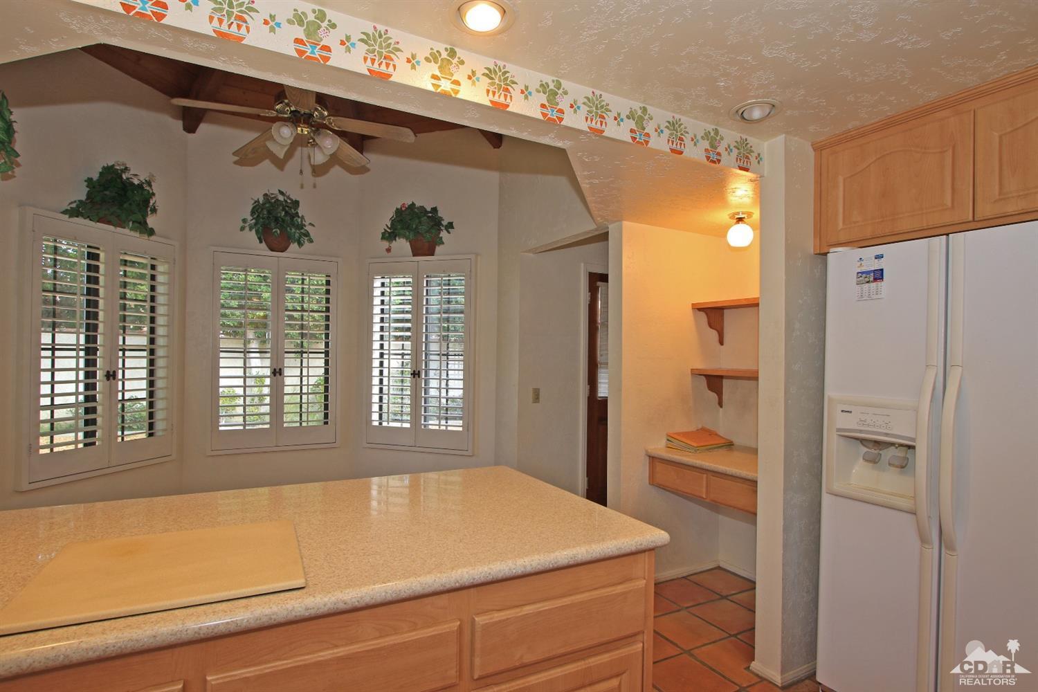 70400 Chappel Road Rancho Mirage, CA 92270 - Photo 25 of 49 a room with a bed and a window