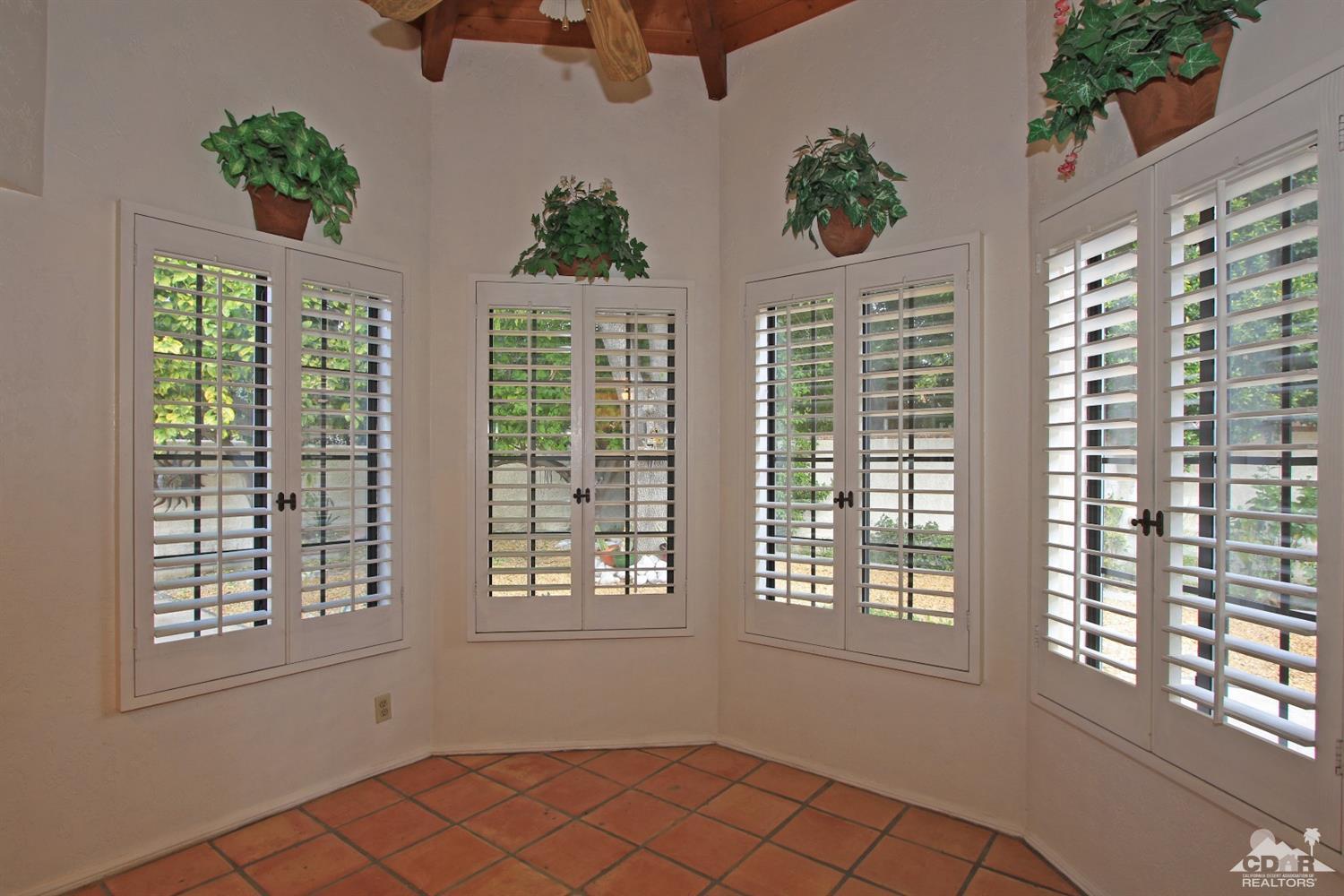 70400 Chappel Road Rancho Mirage, CA 92270 - Photo 26 of 49 a view of an empty room with a window