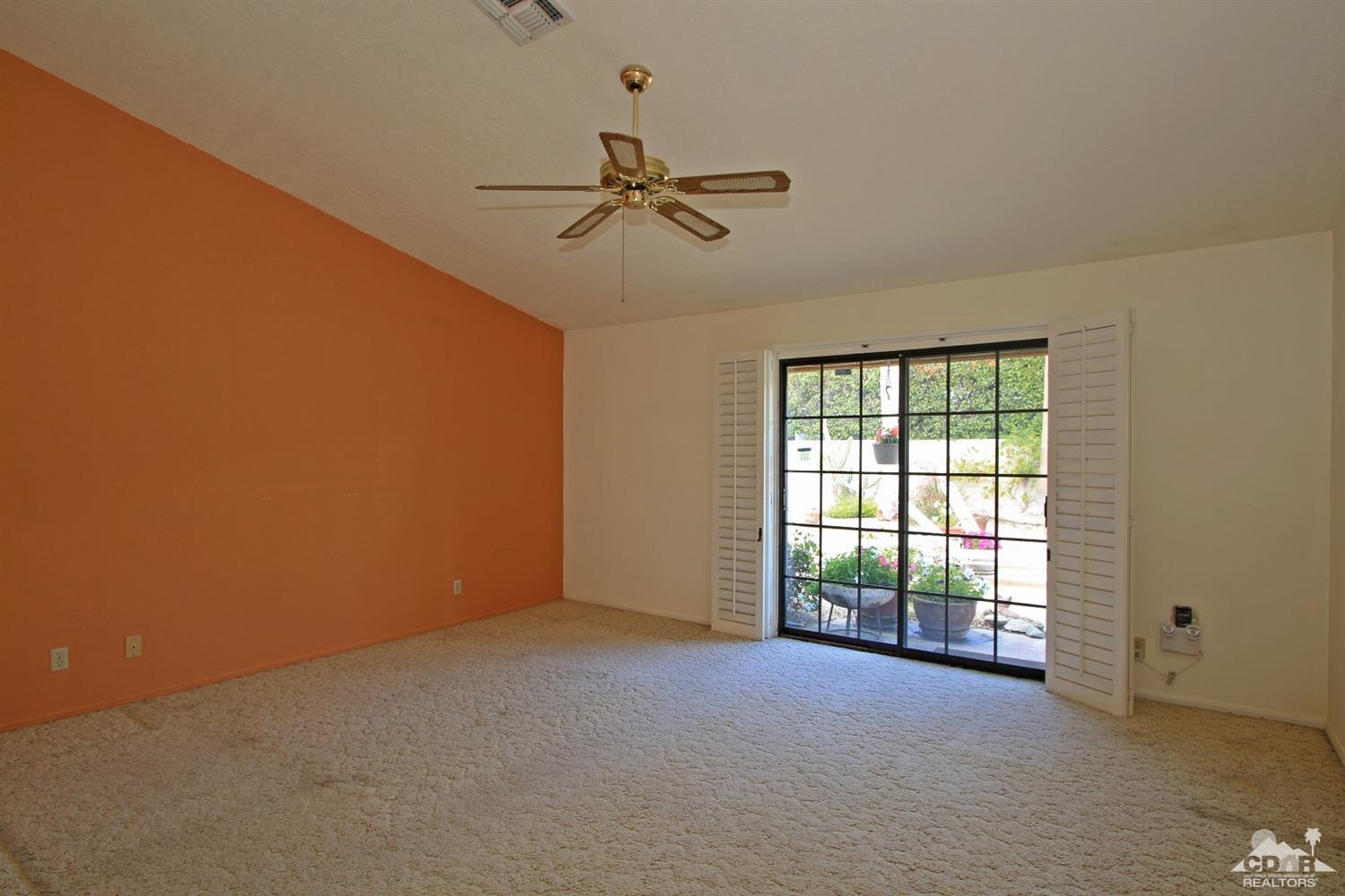 70400 Chappel Road Rancho Mirage, CA 92270 - Photo 27 of 49 an empty room with windows