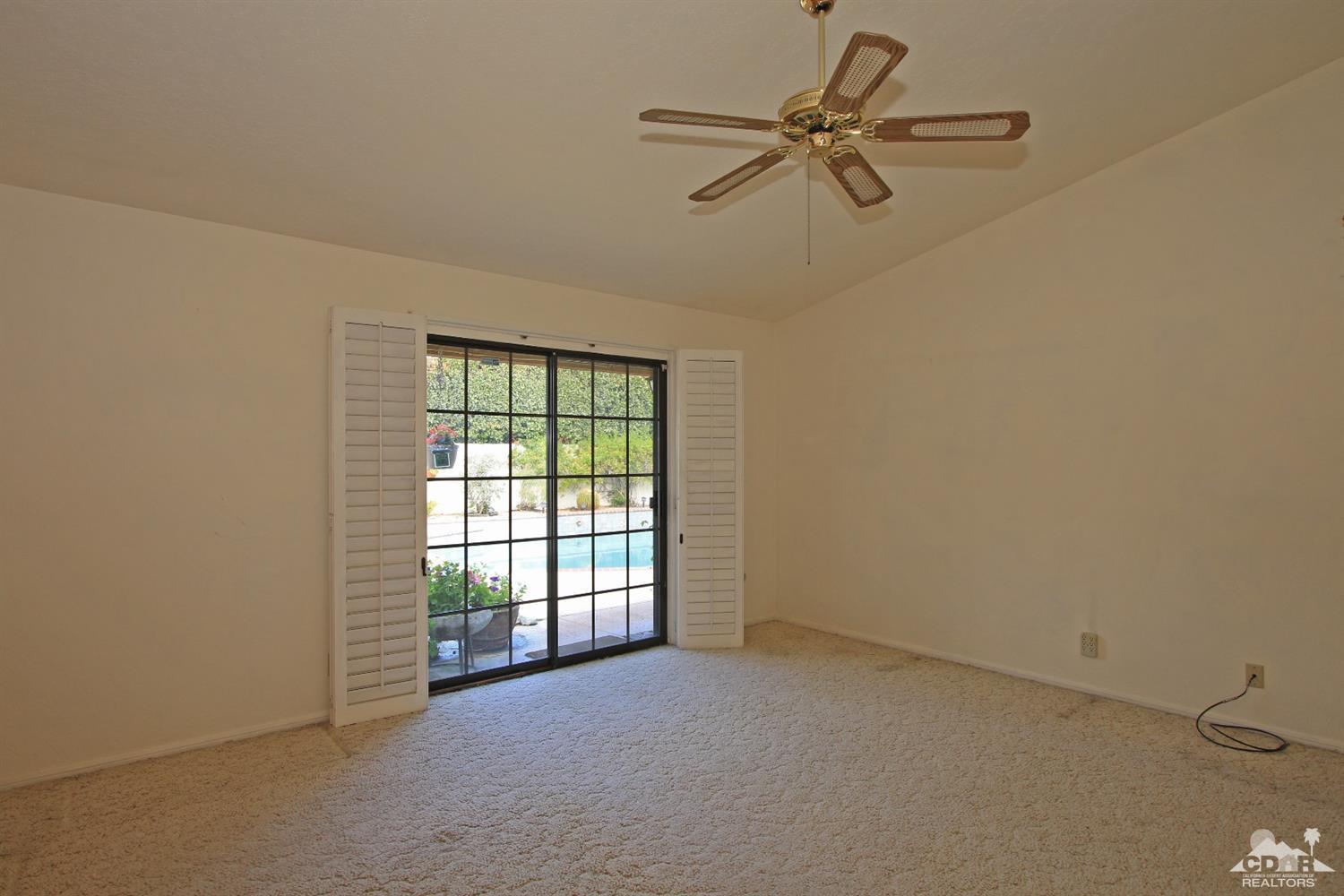 70400 Chappel Road Rancho Mirage, CA 92270 - Photo 28 of 49 a view of an empty room with a window