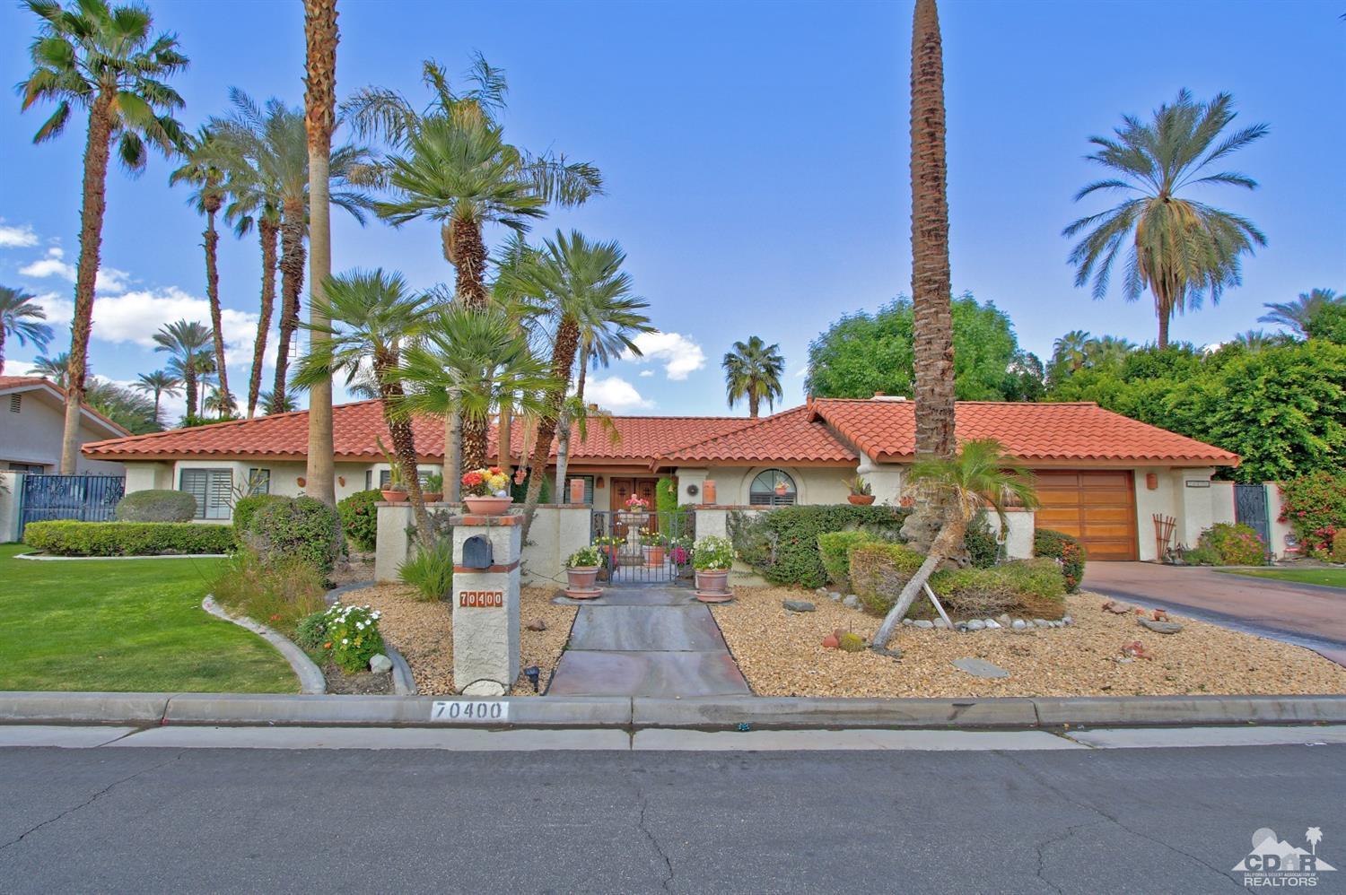 70400 Chappel Road Rancho Mirage, CA 92270 - Photo 4 of 49 a front view of a house with garden