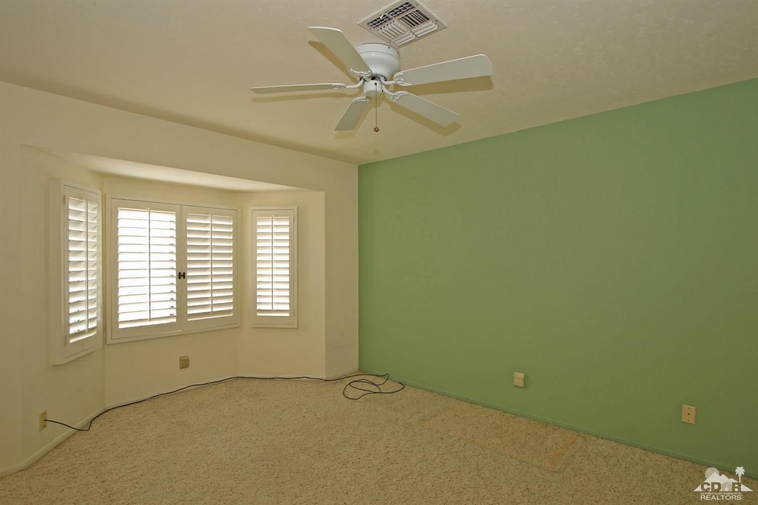 70400 Chappel Road Rancho Mirage, CA 92270 - Photo 32 of 49 a view of an empty room with a window