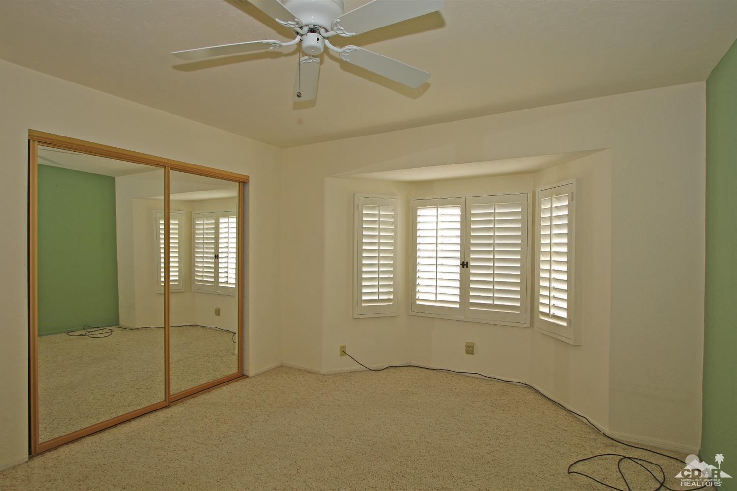 70400 Chappel Road Rancho Mirage, CA 92270 - Photo 33 of 49 a view of an empty room with a window