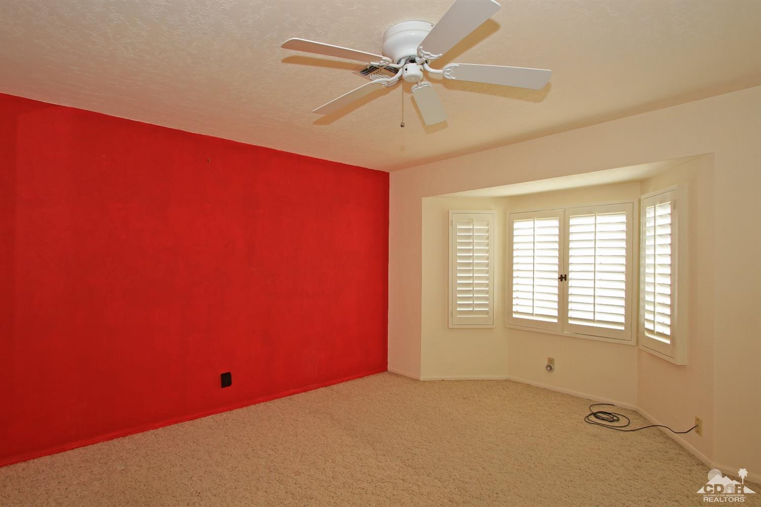 70400 Chappel Road Rancho Mirage, CA 92270 - Photo 35 of 49 an empty room with windows