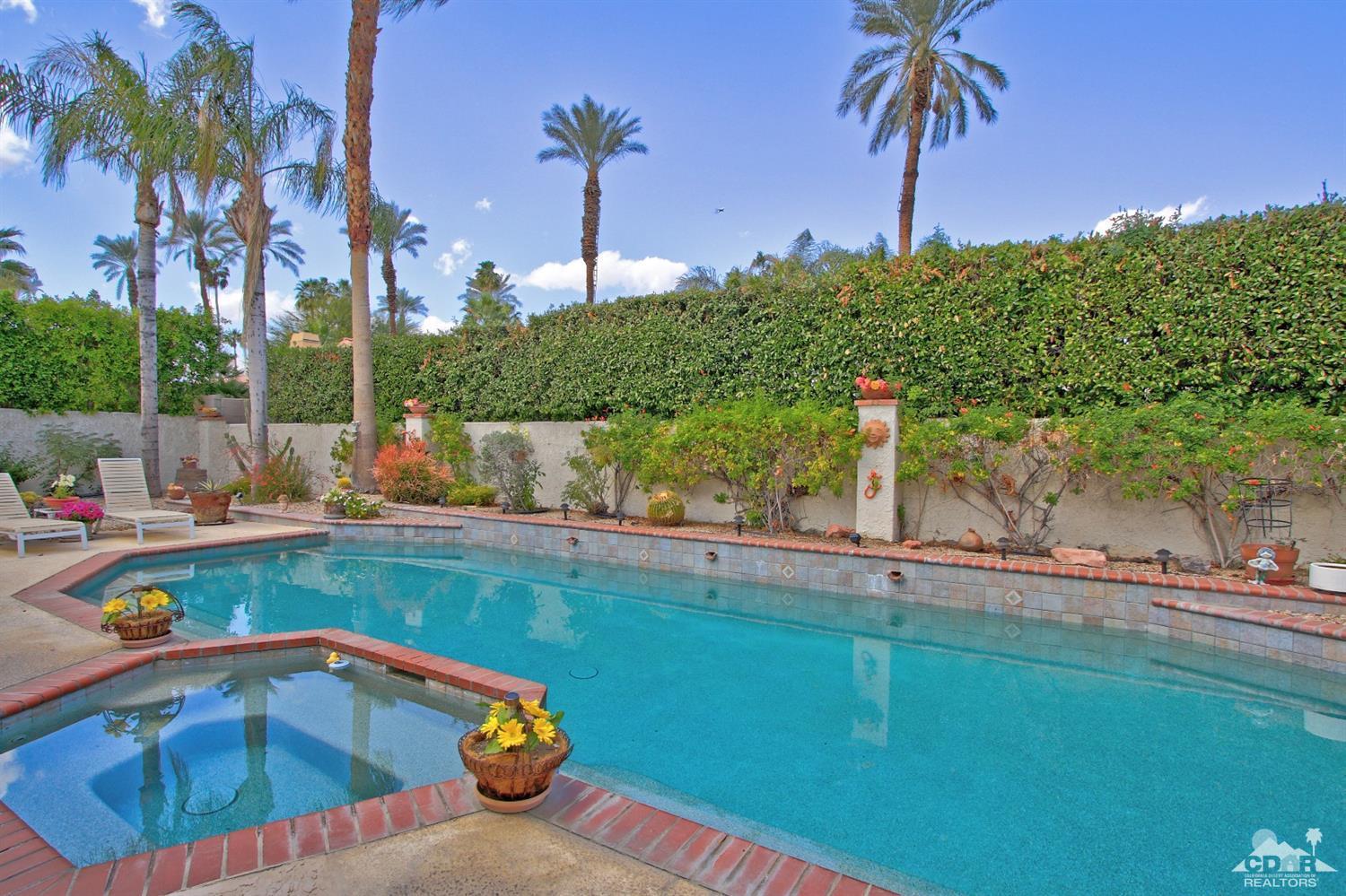 70400 Chappel Road Rancho Mirage, CA 92270 - Photo 39 of 49 a view of a backyard and swimming pool