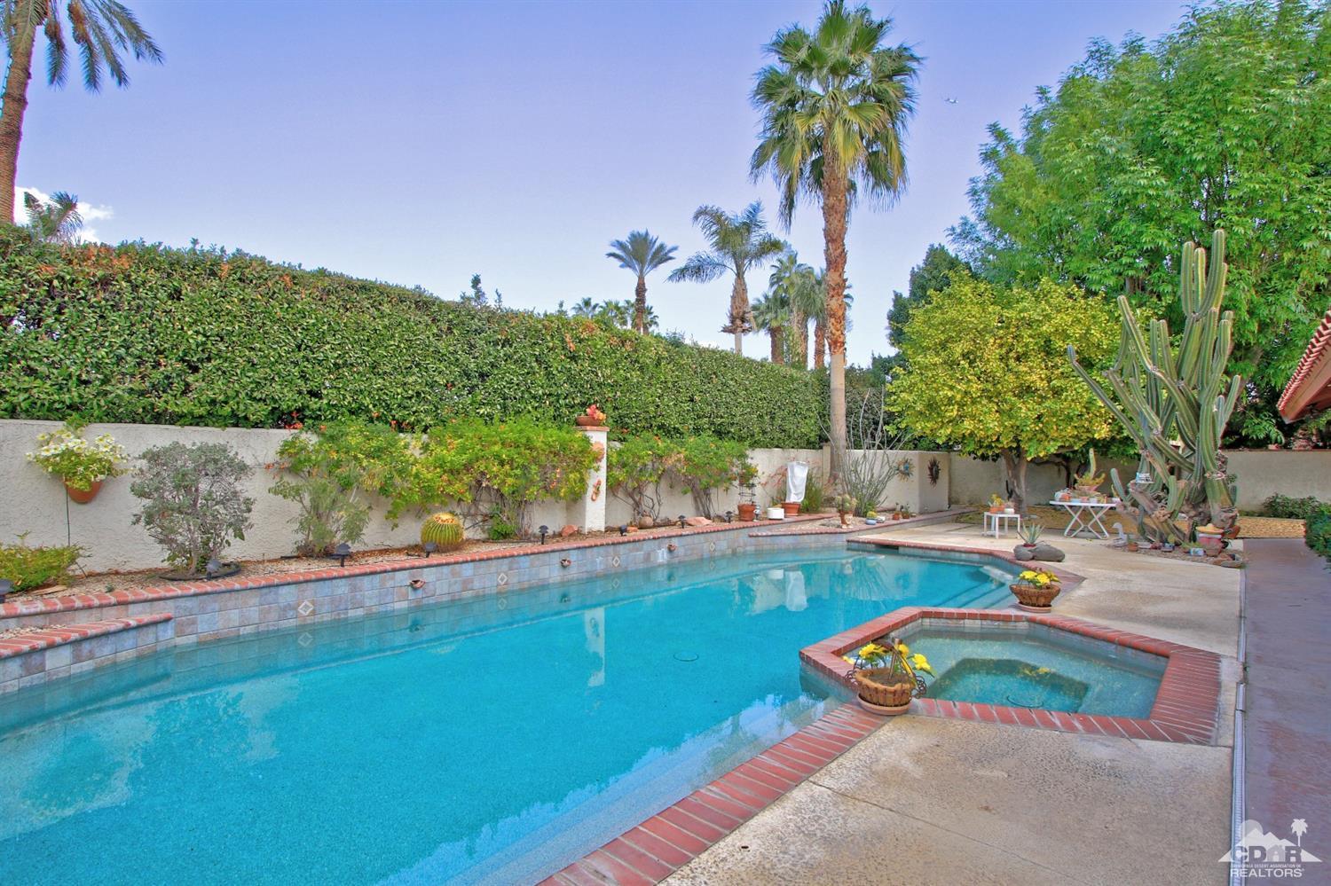 70400 Chappel Road Rancho Mirage, CA 92270 - Photo 40 of 49 a view of a backyard with swimming pool