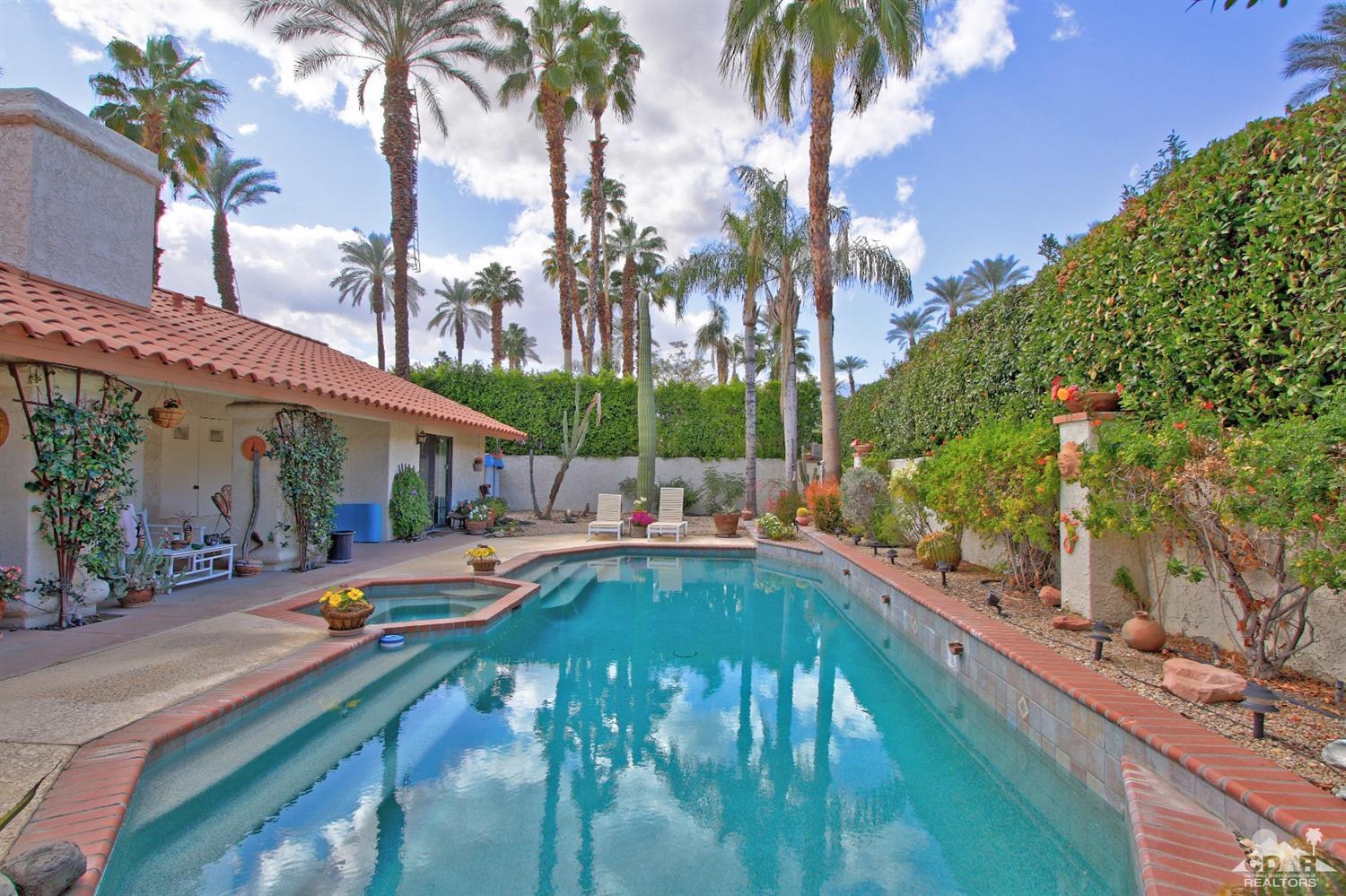 70400 Chappel Road Rancho Mirage, CA 92270 - Photo 41 of 49 a view of swimming pool with outdoor seating and a patio
