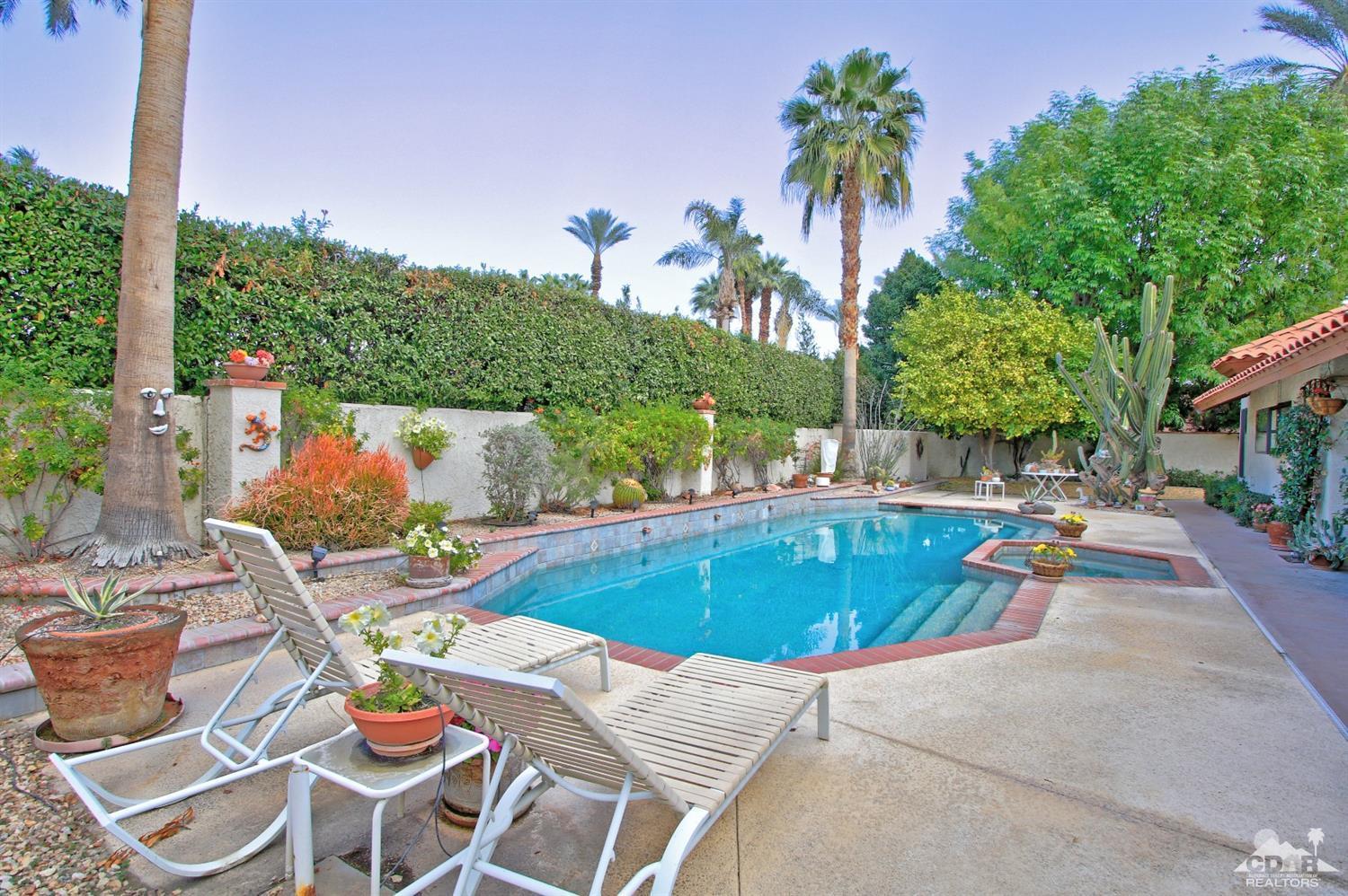70400 Chappel Road Rancho Mirage, CA 92270 - Photo 43 of 49 a view of a swimming pool with a patio