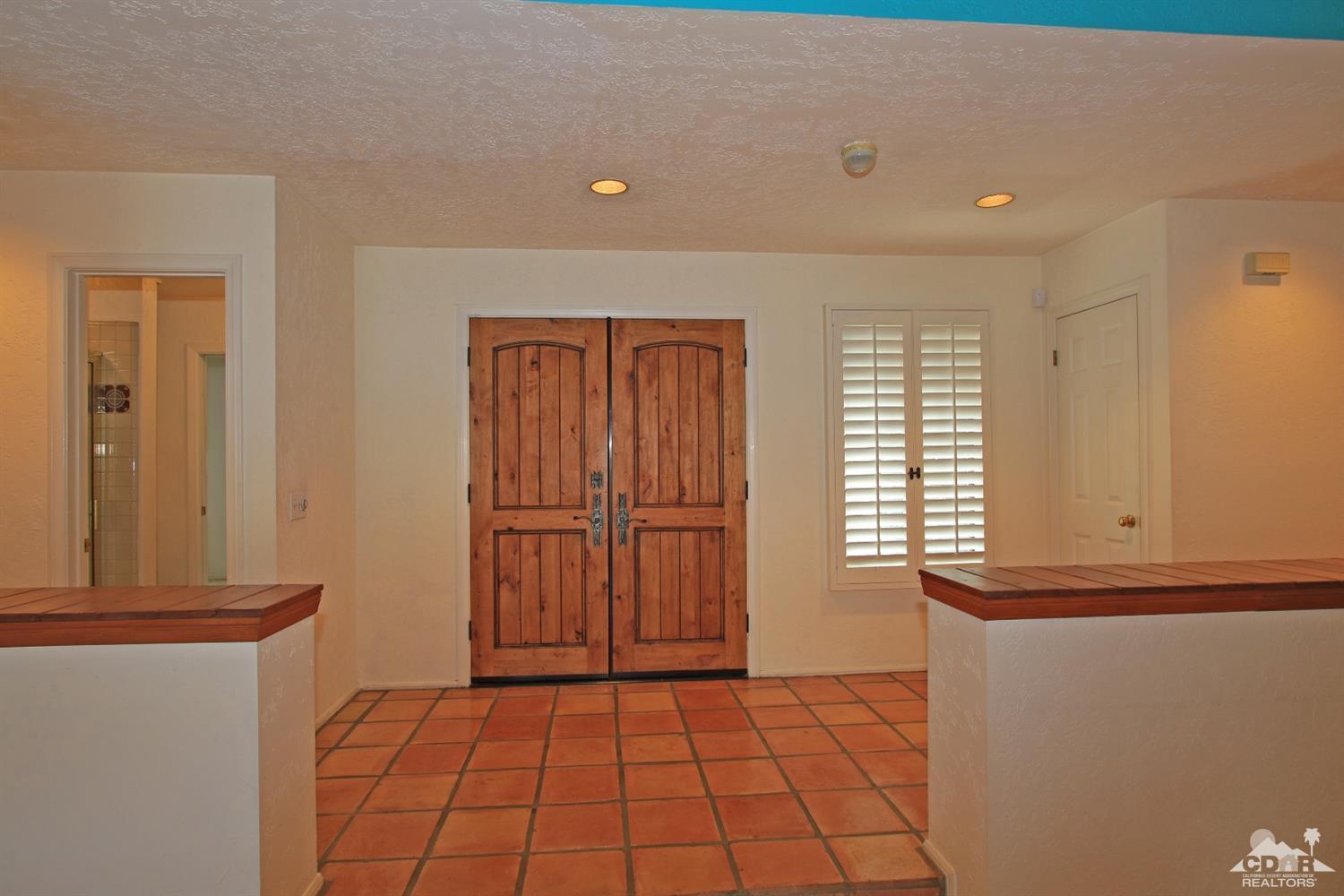 70400 Chappel Road Rancho Mirage, CA 92270 - Photo 7 of 49 a view of a livingroom with a fireplace