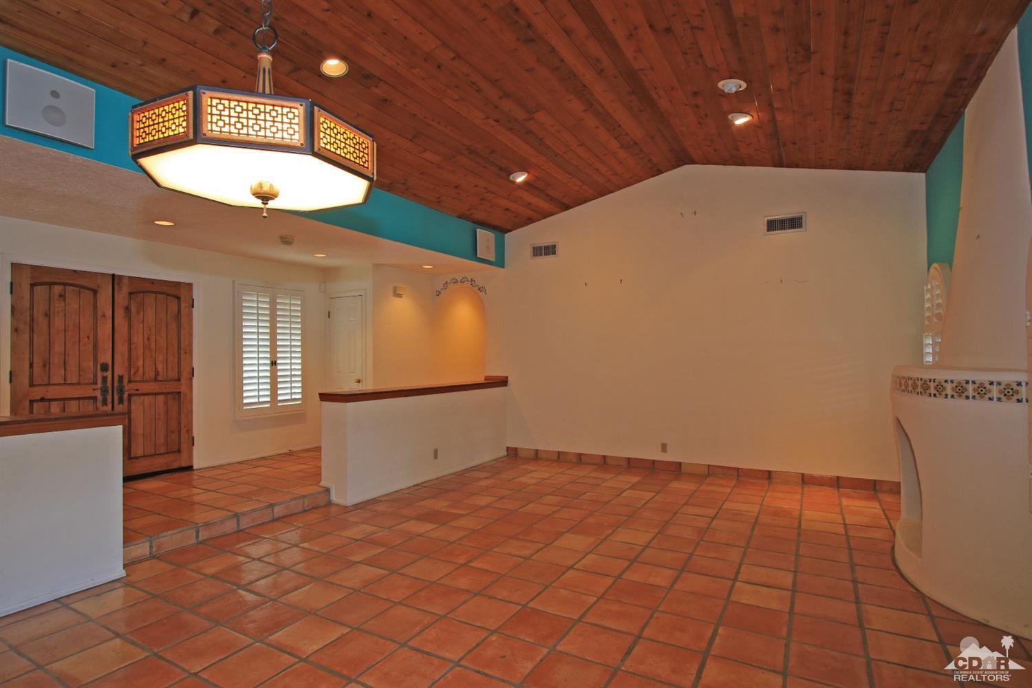 70400 Chappel Road Rancho Mirage, CA 92270 - Photo 8 of 49 a view of an empty room with a window