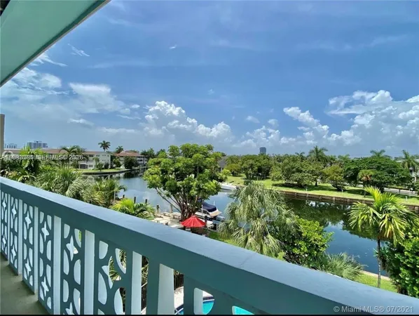 a view of a lake from a balcony