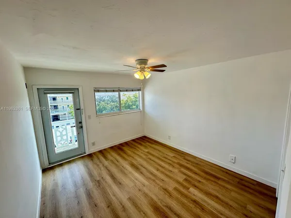 a view of an empty room and window