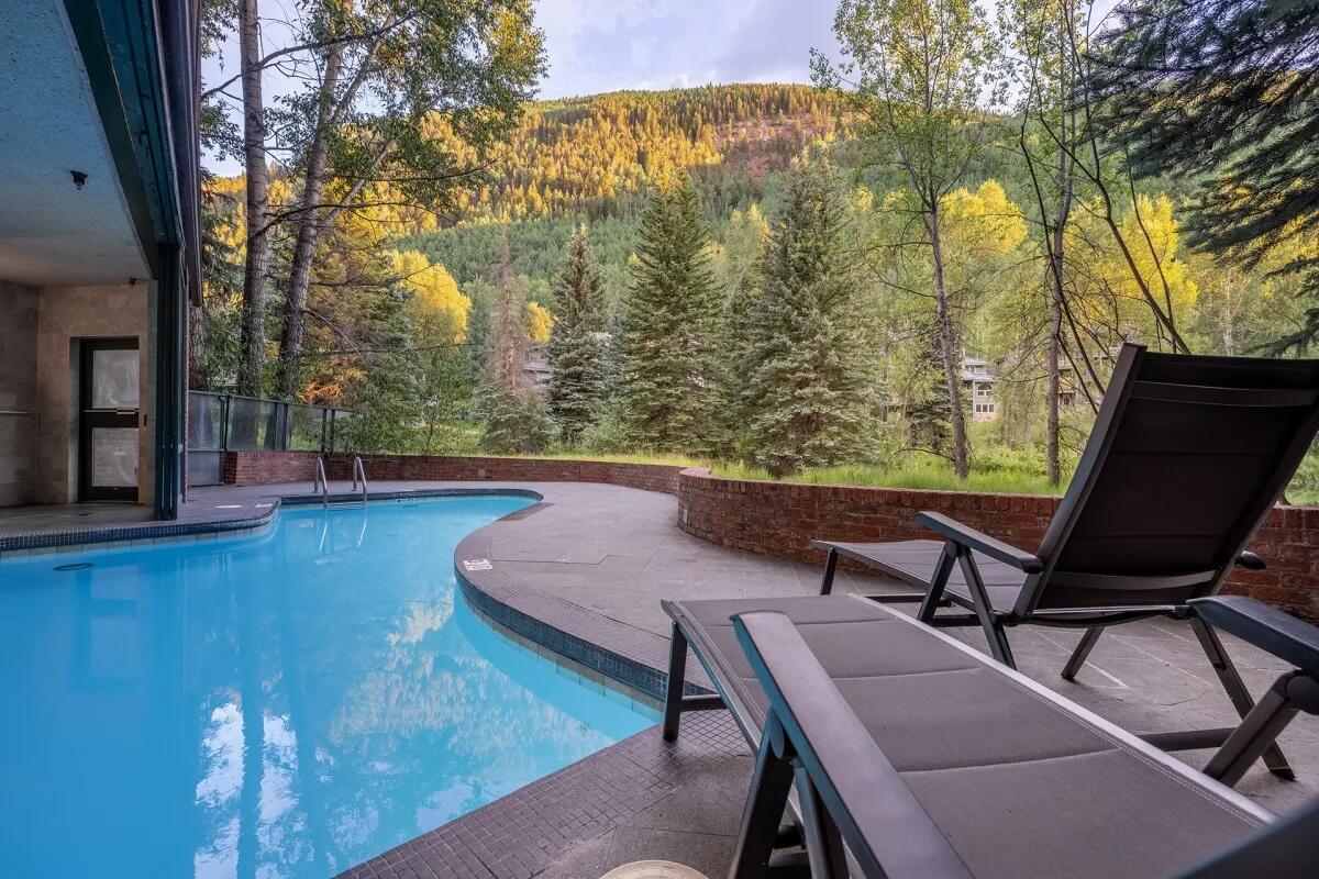 310 South Fir Street, Unit 305 Telluride, CO 81435 - Photo 12 of 14 a view of a chairs and table in patio