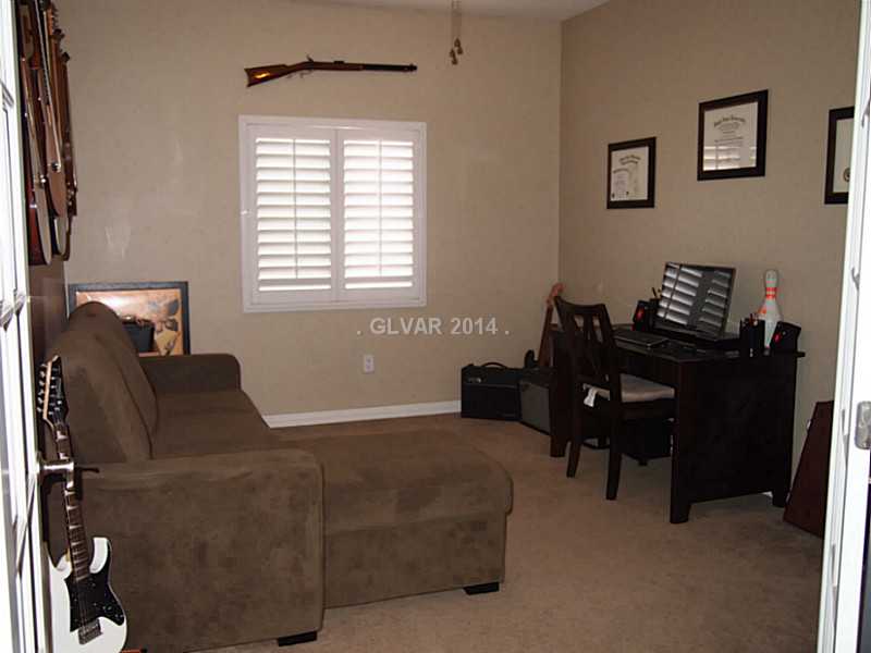 6811 Rose River Falls Street Las Vegas, NV 89131 - Photo 26 of 35 Property Photo. Den with glass French doors