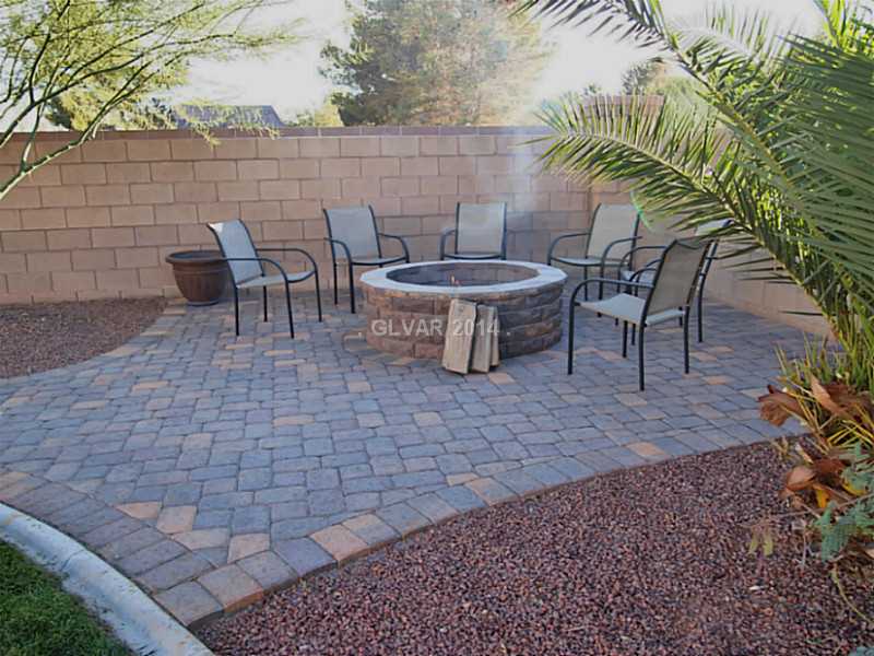 6811 Rose River Falls Street Las Vegas, NV 89131 - Photo 30 of 35 Property Photo. Fire pit with paver surround