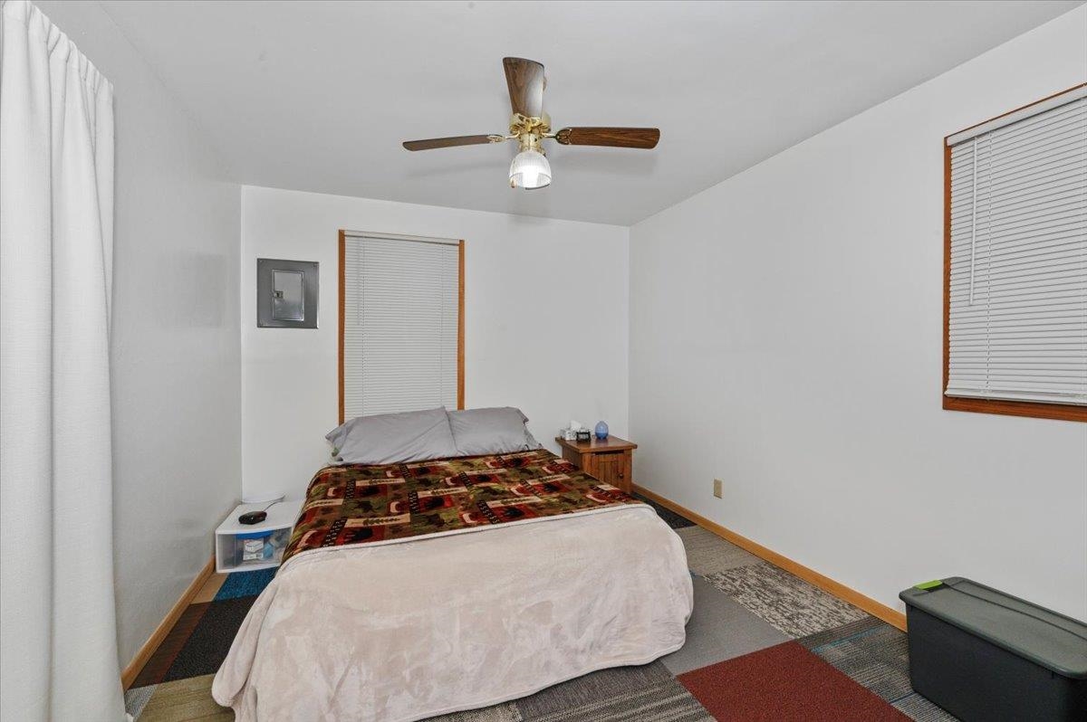 3729 East 2nd Street Superior, WI 54880 - Photo 12 of 20 Bedroom with baseboards, a ceiling fan, and carpet flooring
