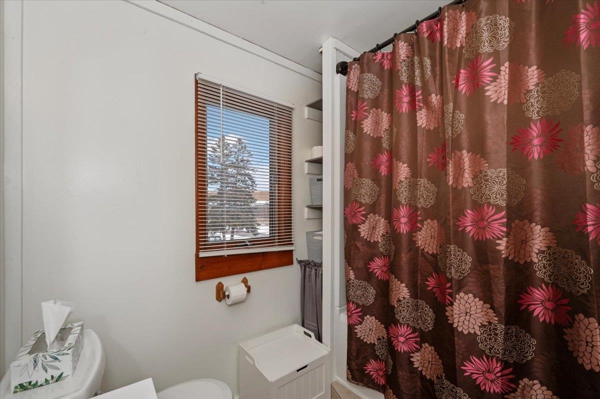 3729 East 2nd Street Superior, WI 54880 - Photo 14 of 20 Bathroom featuring a shower with shower curtain and toilet