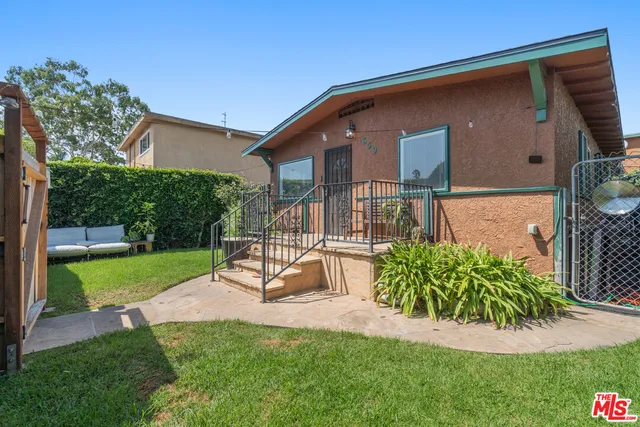 a view of a backyard with a slide
