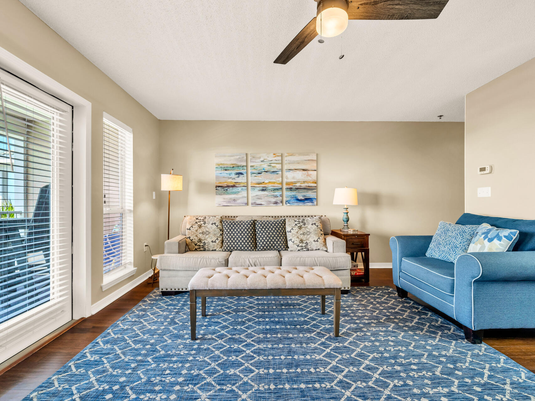 144 Spires Lane, Unit 410 Santa Rosa Beach, FL 32459 - Photo 11 of 33 a living room with furniture and a rug
